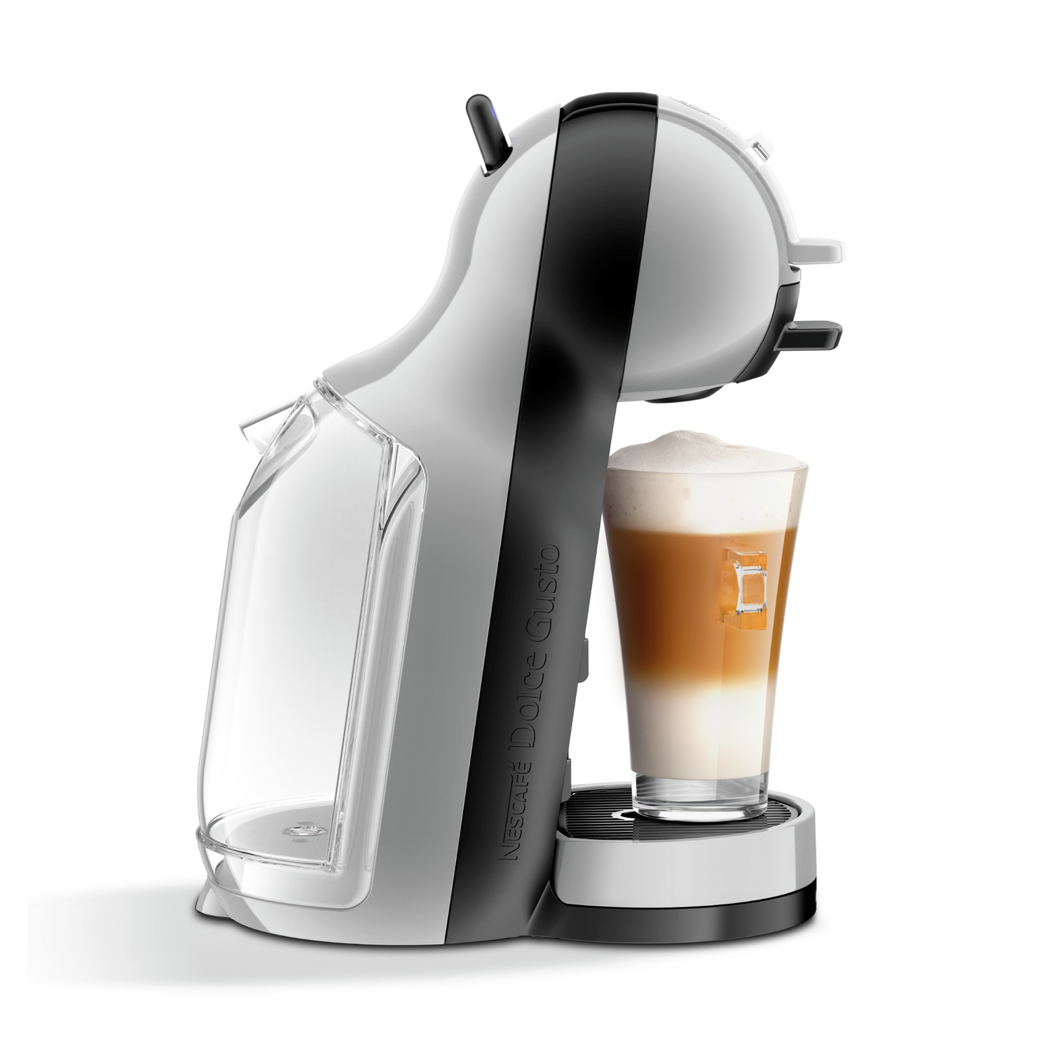 A white and black Dolce Gusto coffee machine with a glass of layered coffee. Clear water container on the side.