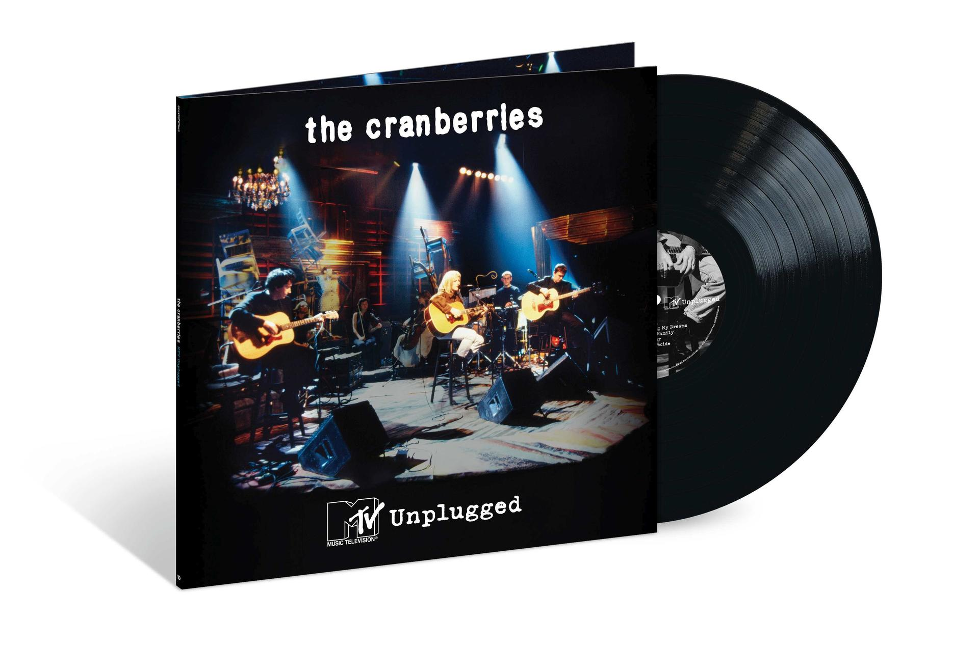 The Cranberries MTV Unplugged Vinyl Album Cover mit Band auf Bühne, schwarzes Vinyl daneben.