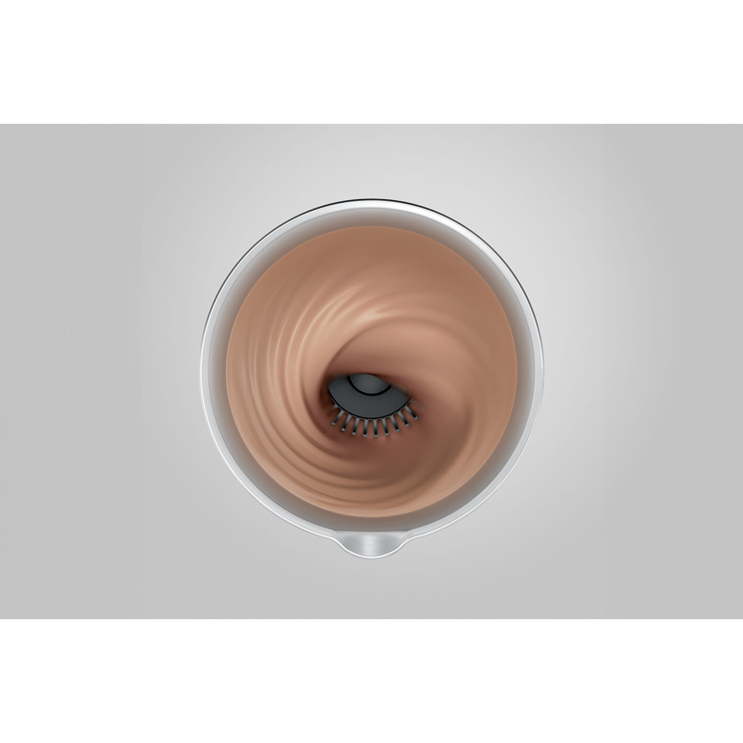Top-down view of a blender. Inside, a light brown liquid swirls around a black blade. The blender is in a clear container.