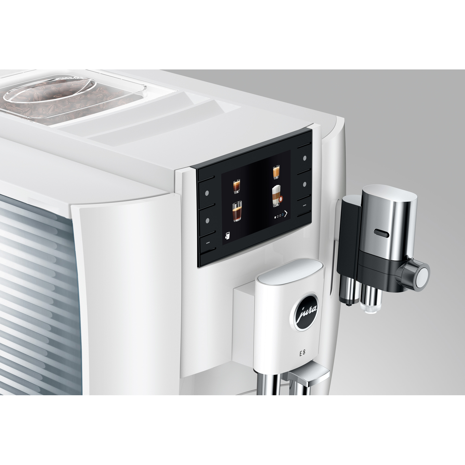A white Jura E8 coffee machine. It has a touchscreen display showing coffee options. A chrome spout and a bean container are also visible.