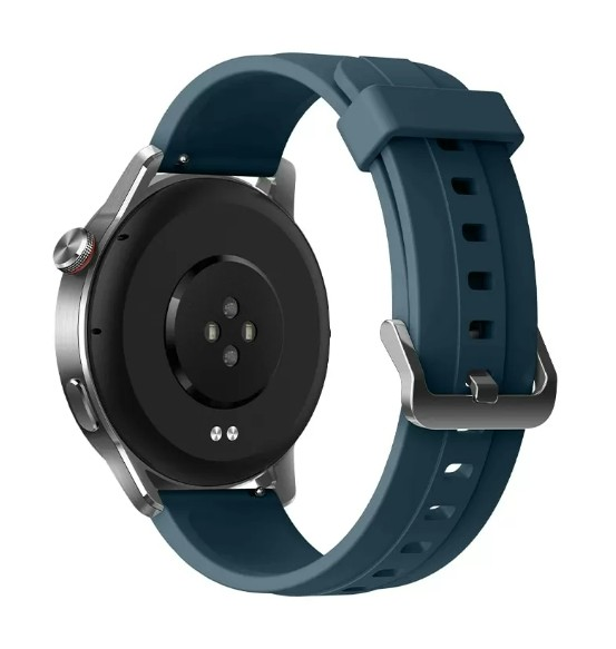 Turkusowy smartwatch z czarnym spodem i czujnikami. Pasek jest turkusowy ze srebrną klamrą, a koperta zegarka srebrna.