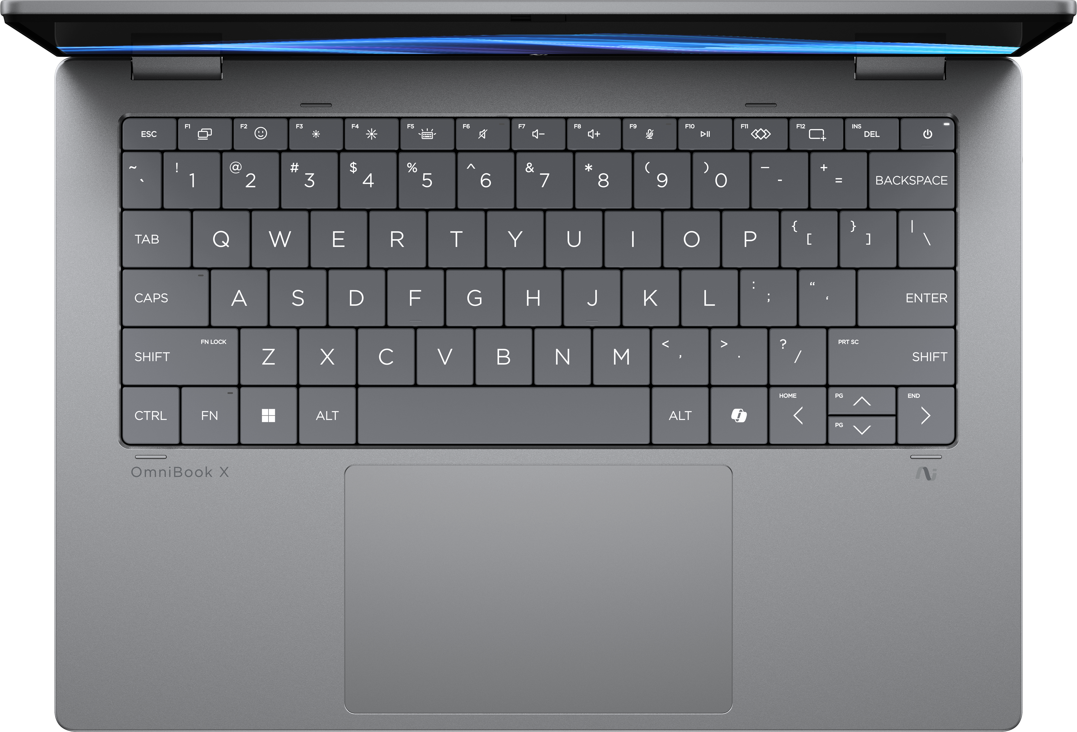 Draufsicht auf einen Laptop. Sichtbar sind Tastatur, Touchpad und der Rahmen des Laptops. Die Tastatur ist grau mit weißen Buchstaben.