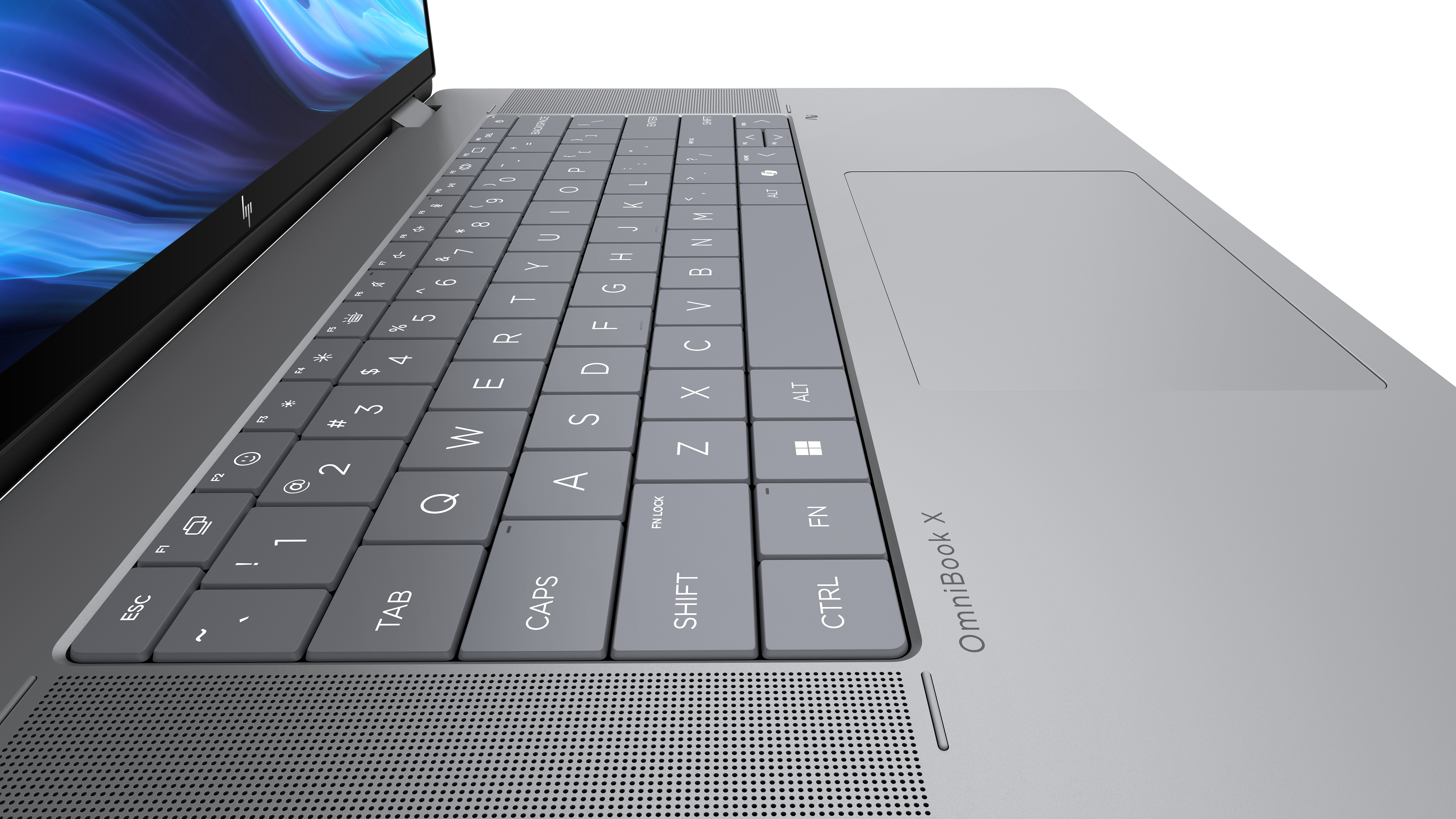 Nahaufnahme einer silbernen Laptop-Tastatur. Die Tastatur hat graue Tasten mit weißen Buchstaben. Der Bildschirm zeigt ein blaues und lila Design.