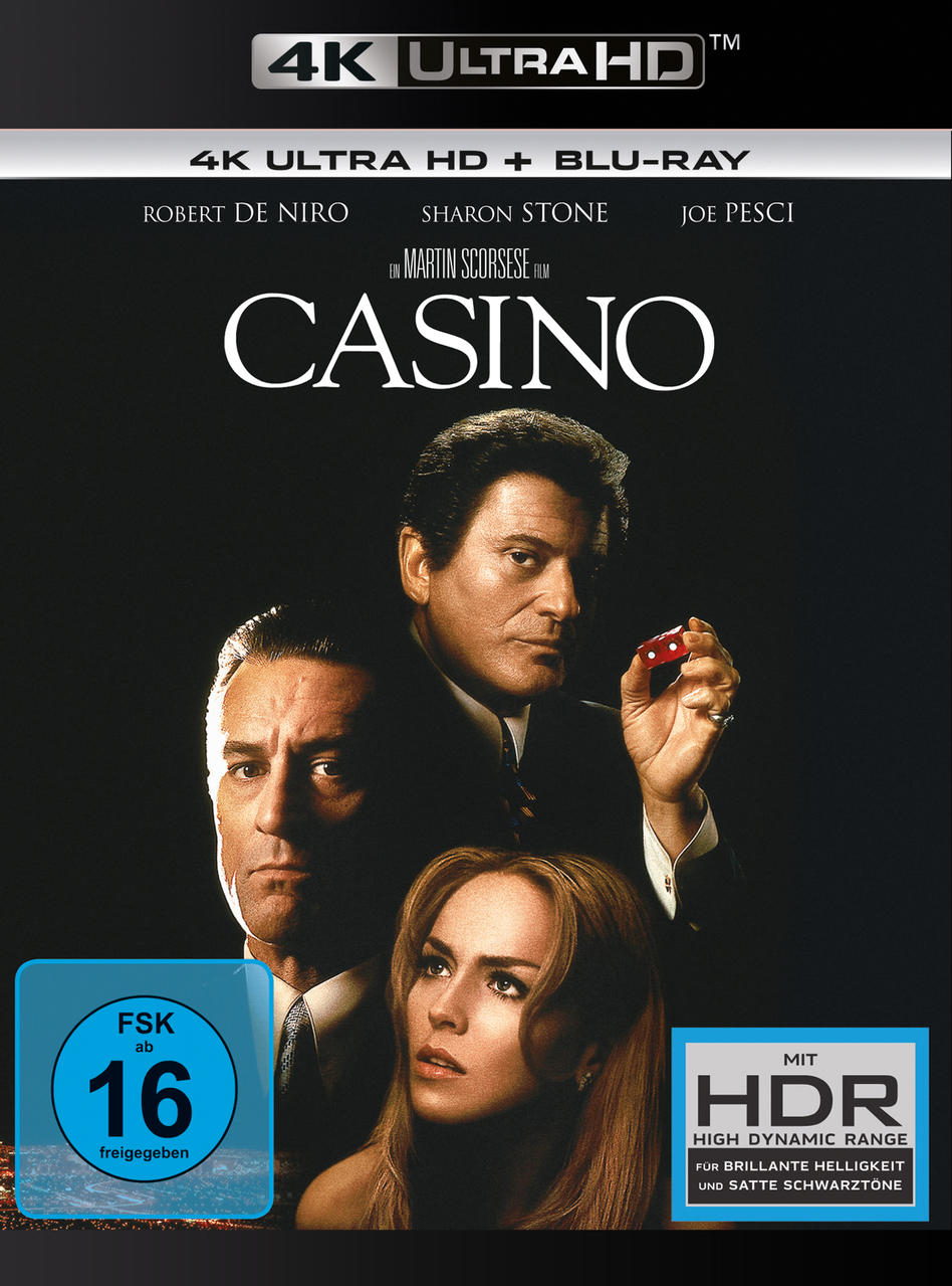 Filmposter für Casino mit Robert De Niro, Sharon Stone und Joe Pesci. Ein Mann hält Würfel. Schwarzer Hintergrund.