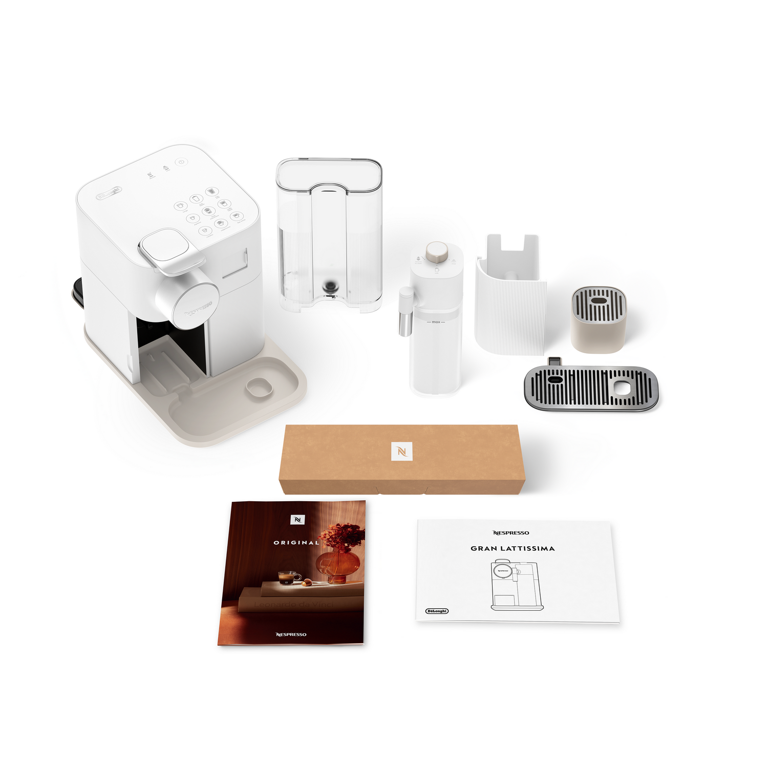 Máquina Nespresso blanca con componentes, caja y manuales dispuestos sobre una superficie blanca. Los artículos son para el modelo Gran Lattissima.
