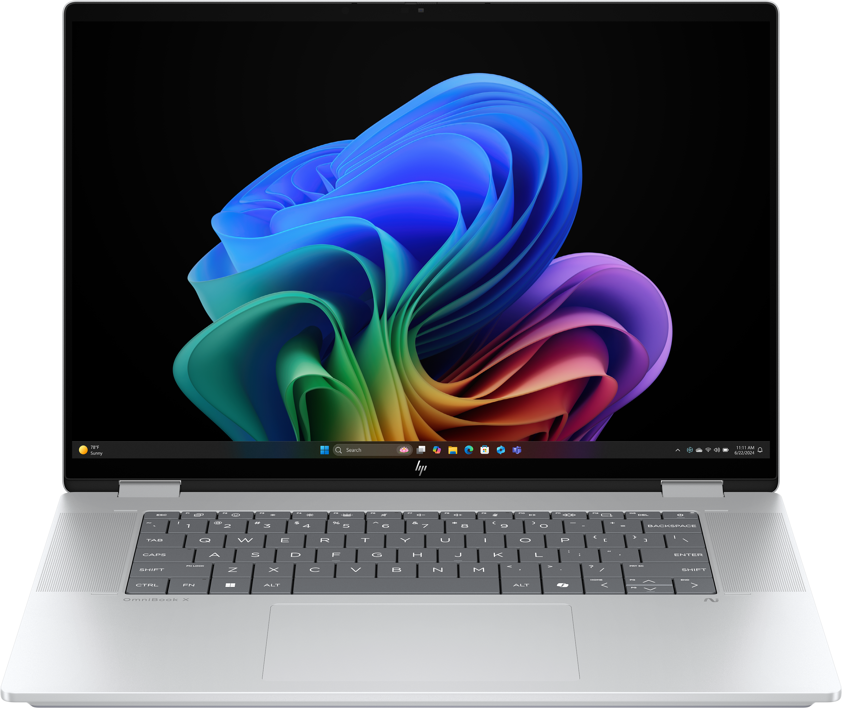Silberner Laptop zeigt ein farbenfrohes abstraktes Bild. Tastatur sichtbar. Der Bildschirm zeigt eine Windows-Oberfläche.