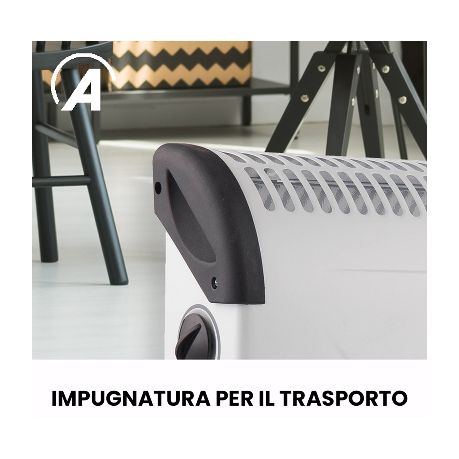Stufa bianca con manico nero. Sullo sfondo una sedia nera e gambe di tavolo. Testo: Maniglia per il trasporto.