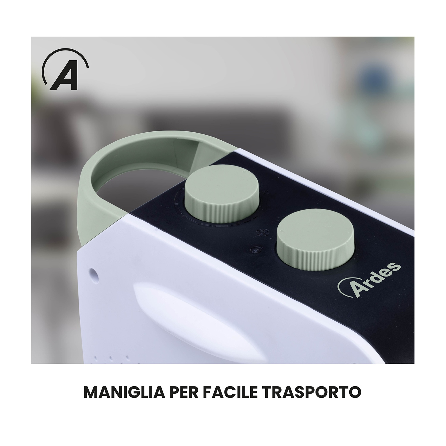 Primo piano di un elettrodomestico bianco e nero con maniglia e manopole verde chiaro. Il marchio 'Ardes' è visibile. Il testo in basso recita: 'MANIGLIA PER FACILE TRASPORTO'.