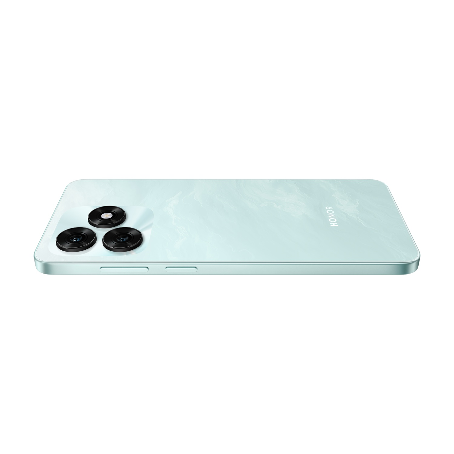 Uno smartphone Honor verde chiaro su sfondo bianco. Ha tre lenti della fotocamera e il logo Honor sul lato.