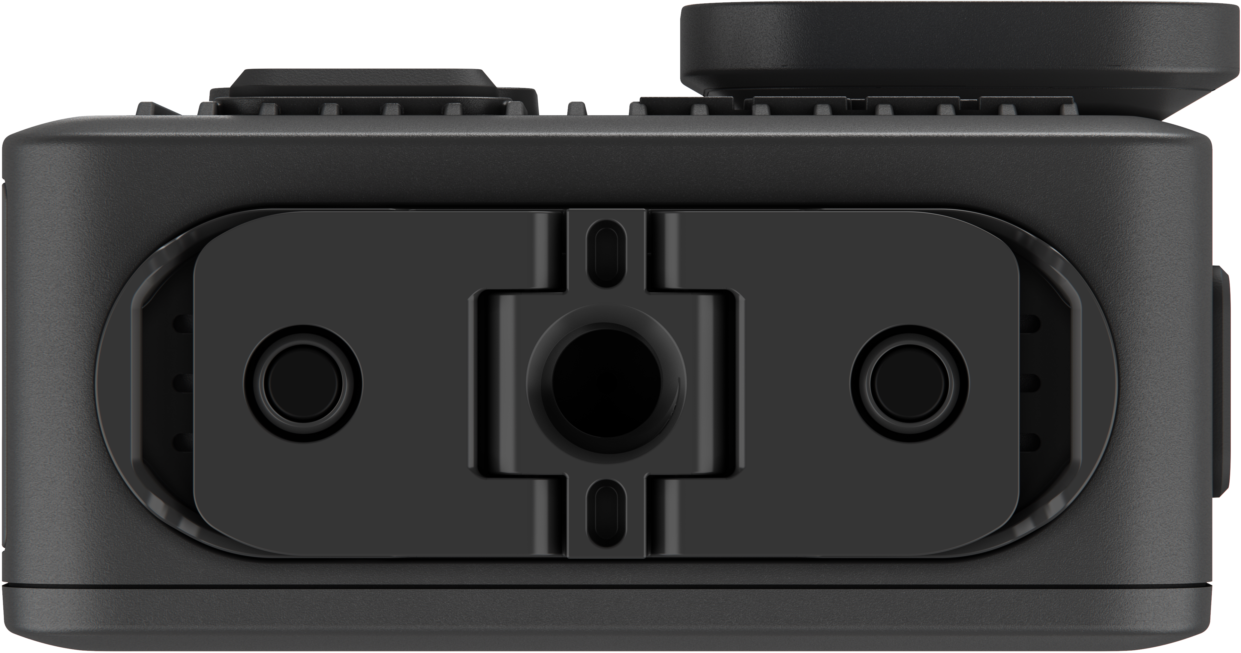 Gros plan d'un appareil noir avec diverses ouvertures et protubérances. Il a une forme rectangulaire avec des bords arrondis.