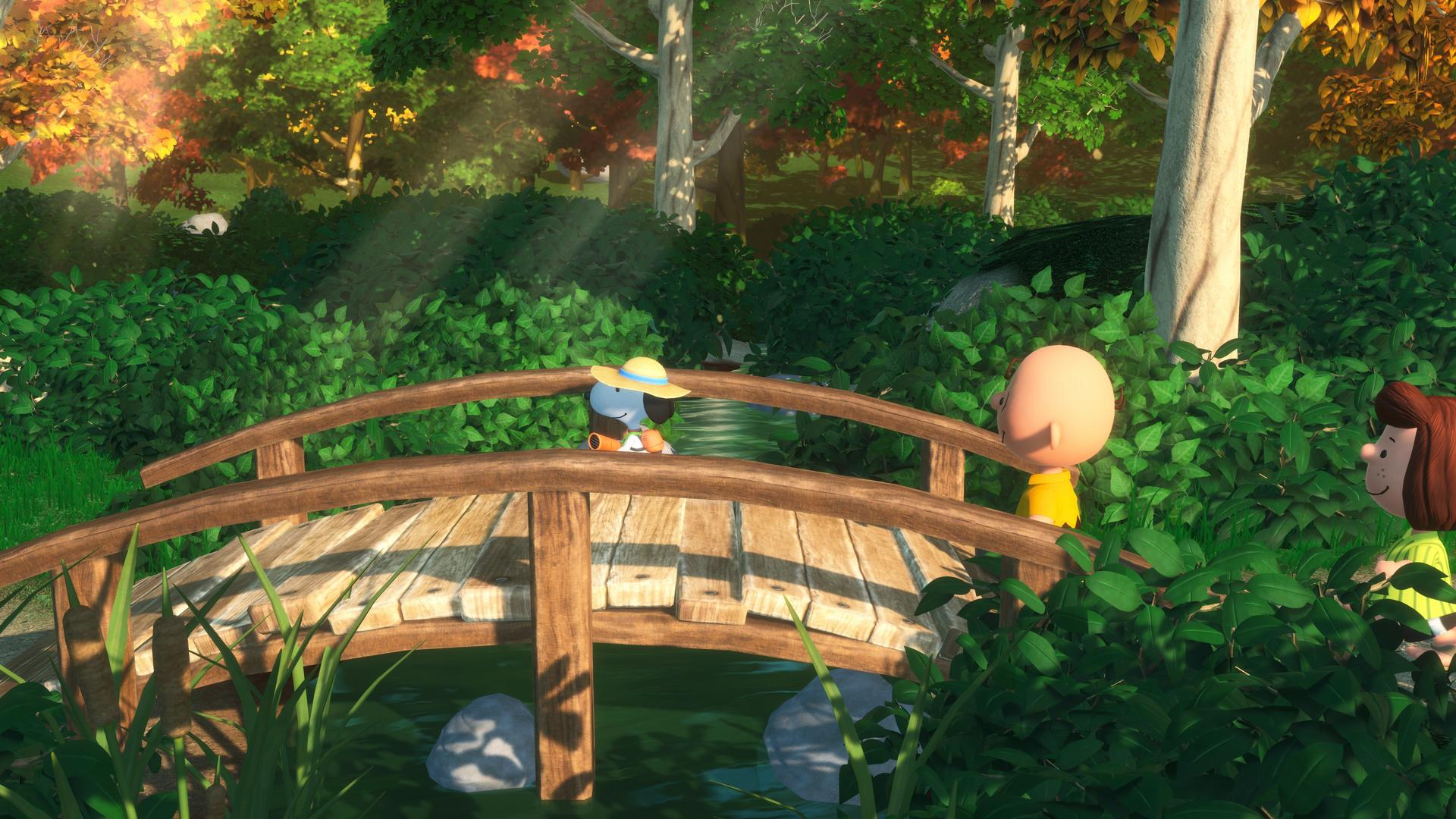 Cartoon-Szene mit Figuren auf einer Holzbrücke über Wasser. Viel Grün und Bäume umgeben die Gegend. Herbstfarben sichtbar.