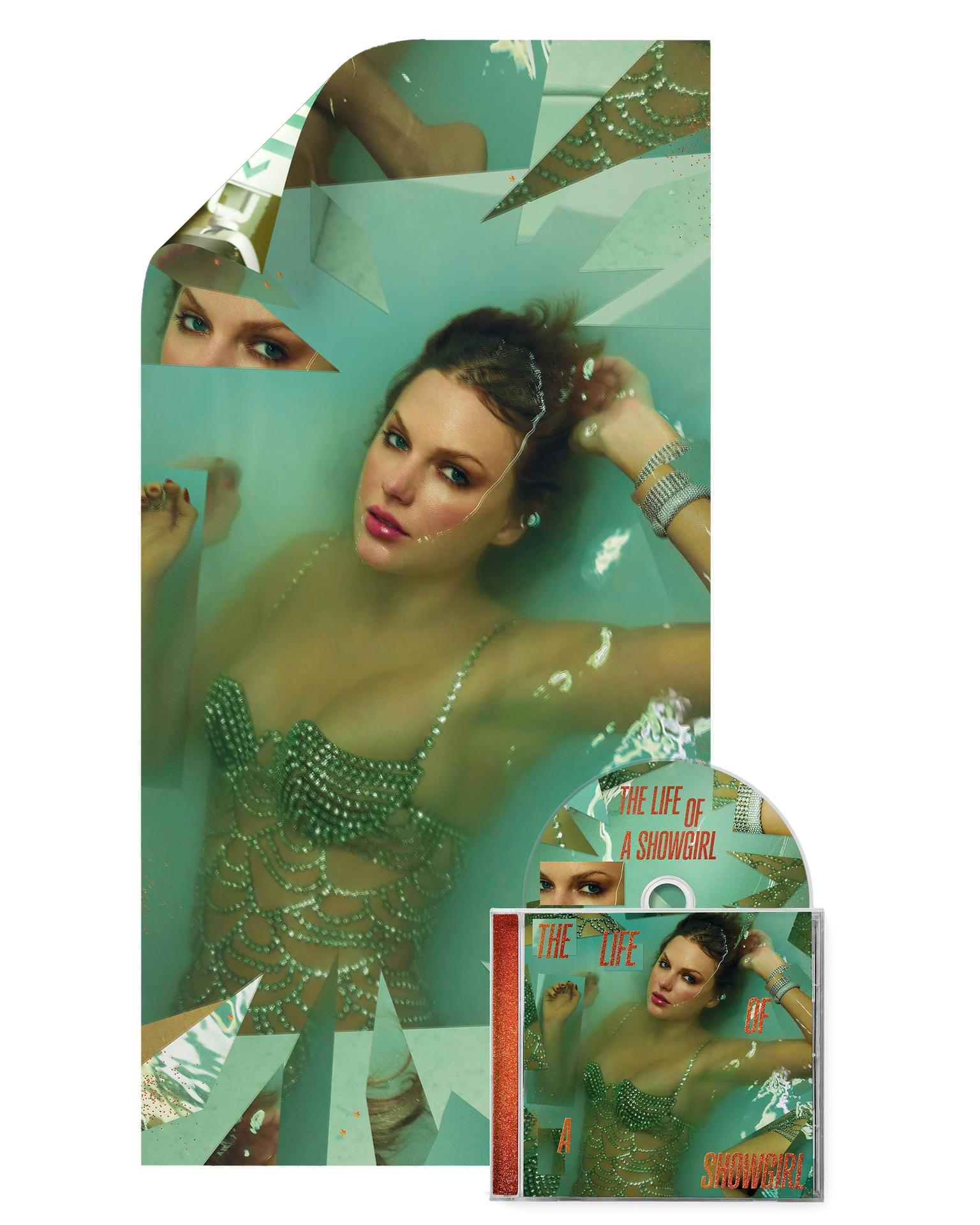 Eine Frau in einem glitzernden Oberteil ist in Wasser getaucht. Ein CD-Cover mit dem gleichen Bild ist ebenfalls vorhanden. Um sie herum befinden sich zerbrochene Spiegeleffekte.