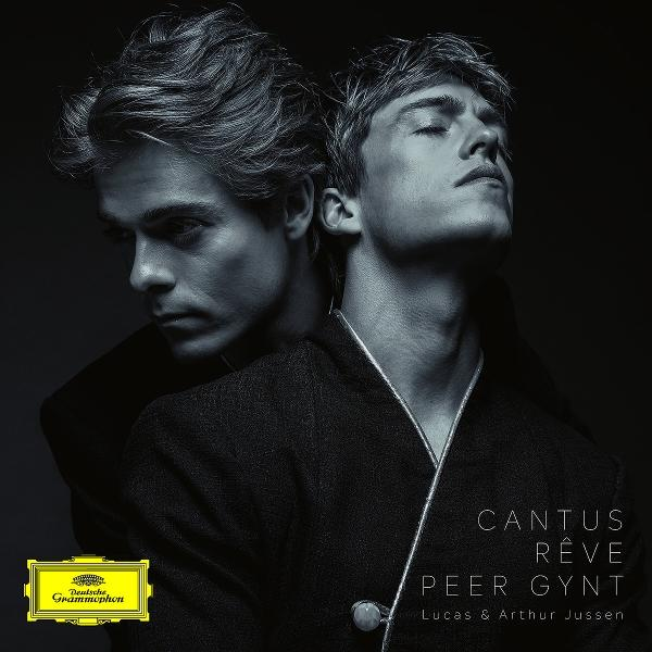 Zwei Männer in Schwarzweiß. Einer blickt weg, der andere hat geschlossene Augen. Albumcover mit Text: Cantus Rêve Peer Gynt.