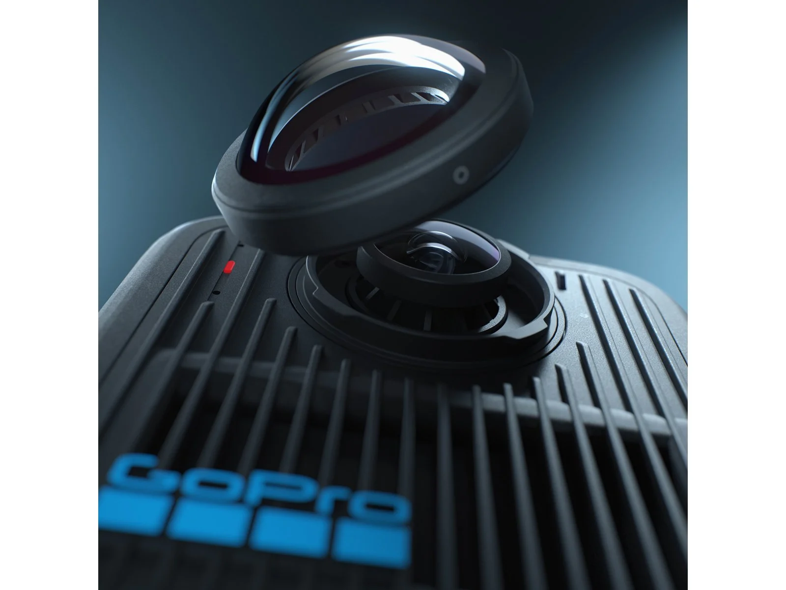 A black GoPro camera with two lenses. The top lens is detached. The GoPro logo is visible in blue.