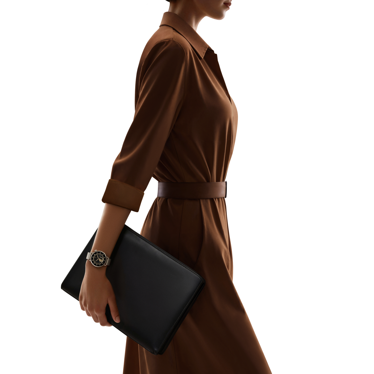Woman in brown dress, holding a black folder, wearing a watch. Brown belt. Black background.