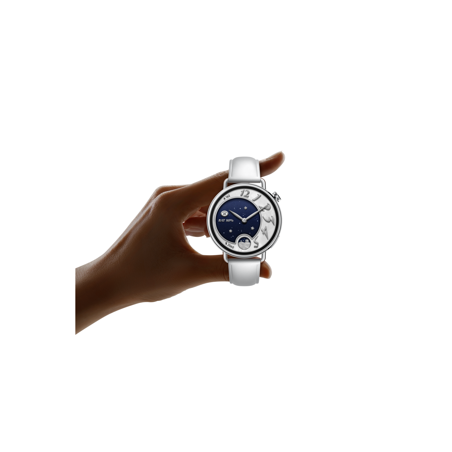 A hand holding a wristwatch with a white strap. The watch face has a night sky design with stars, a moon, and white numbers.