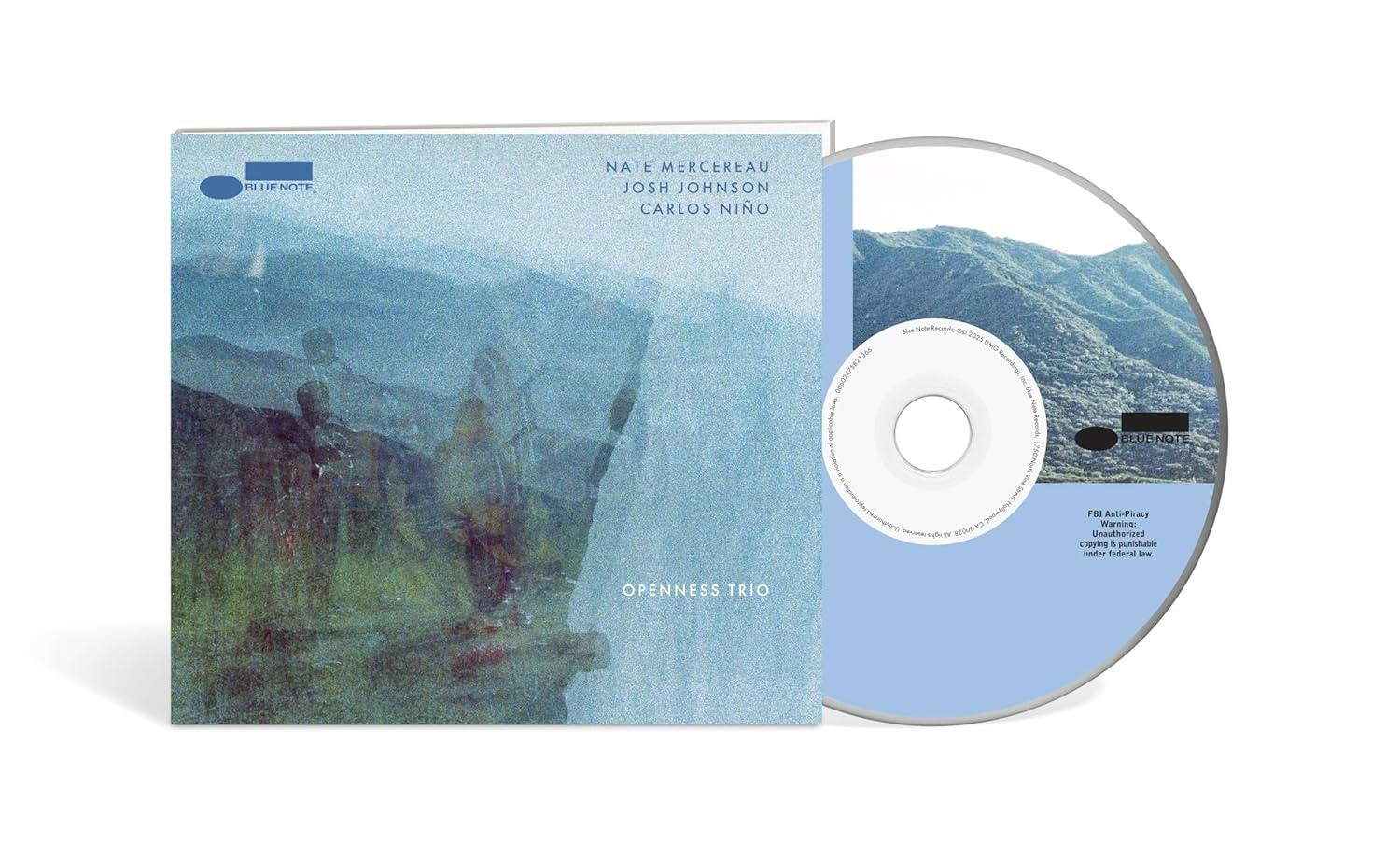 CD mit Albumcover, betitelt 'Openness Trio', mit Nate Mercereau, Josh Johnson, Carlos Niño. Blue Note Logo und eine Berglandschaft.