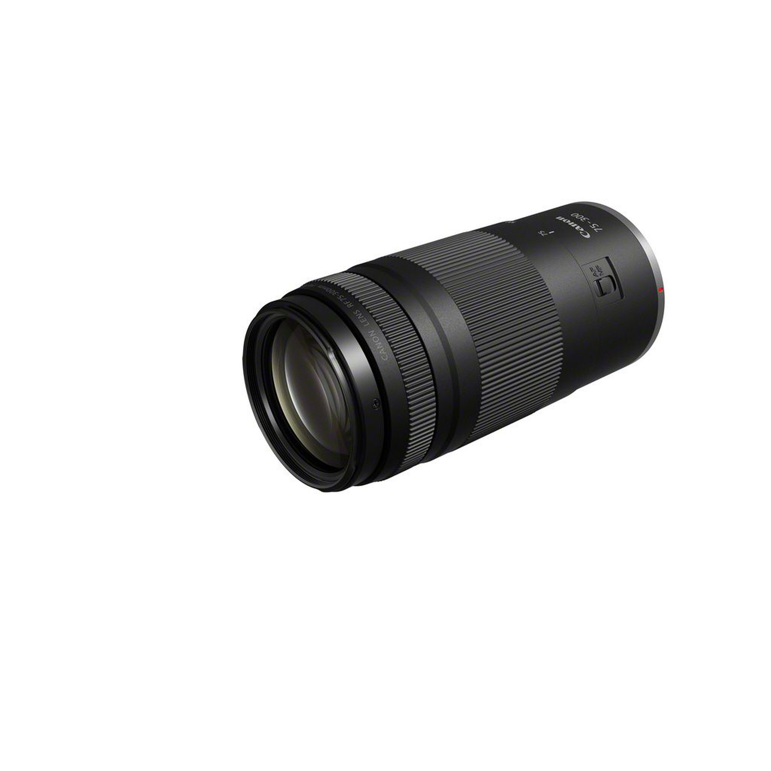 Un objectif Canon RF 75-300mm est posé en diagonale sur fond blanc. L'objectif est noir avec du texte argenté et un point rouge.