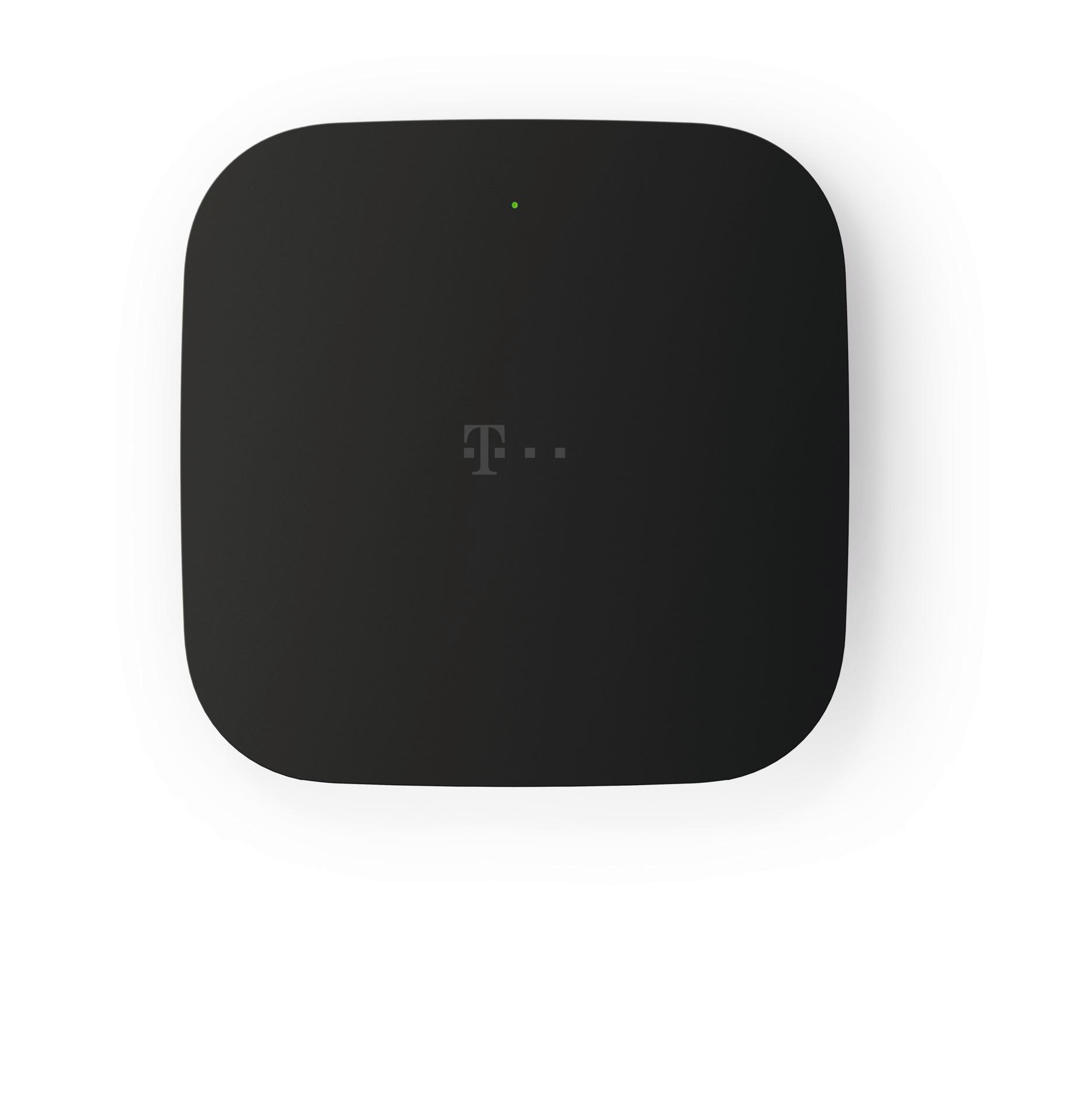 Ein schwarzes quadratisches Gerät mit abgerundeten Ecken und dem T-Mobile-Logo, einem grünen Licht und weißem Hintergrund.