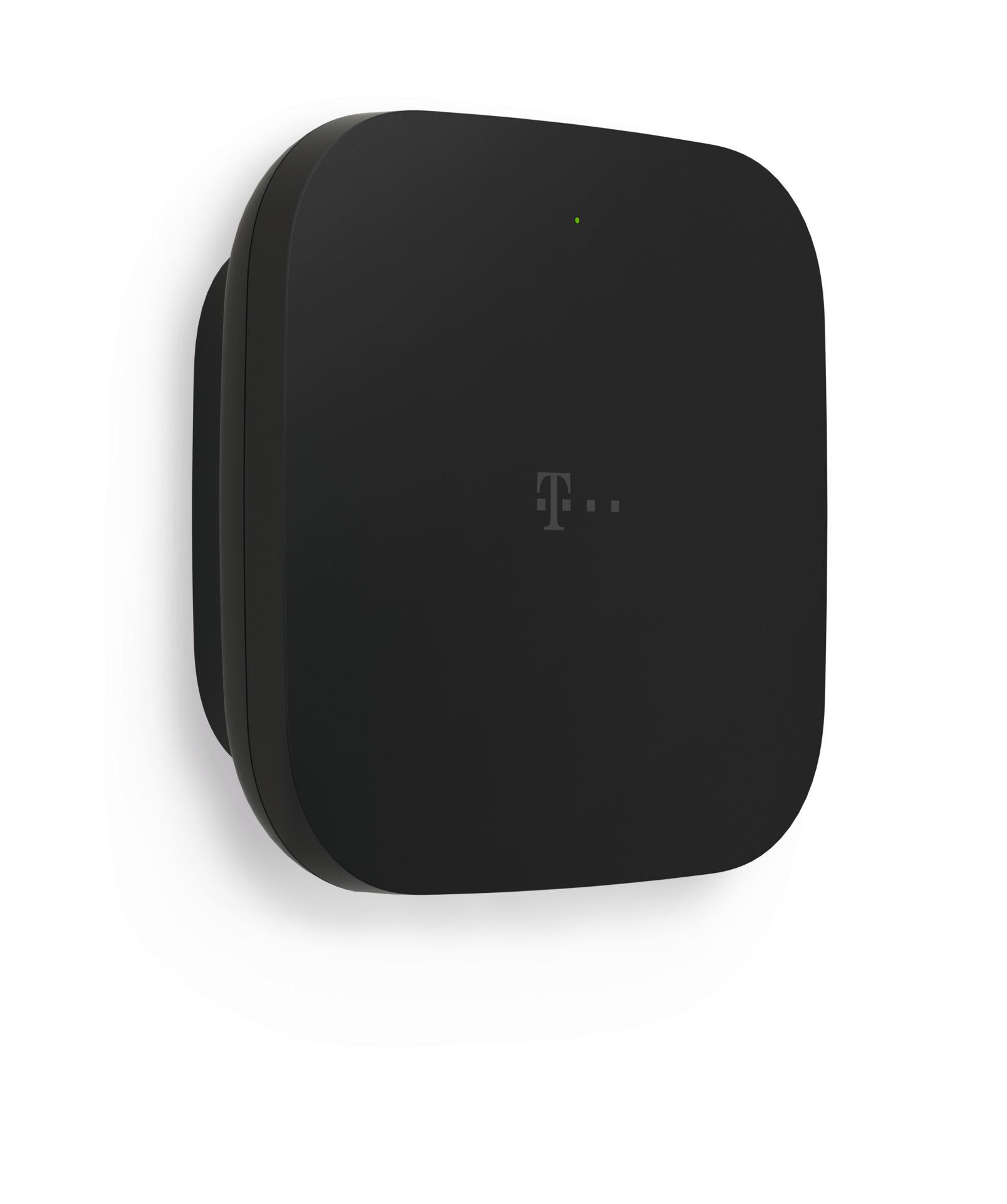 Ein schwarzes, quadratisches Gerät mit abgerundeten Kanten, einem T-Mobile-Logo und einem grünen Licht auf weißem Hintergrund.