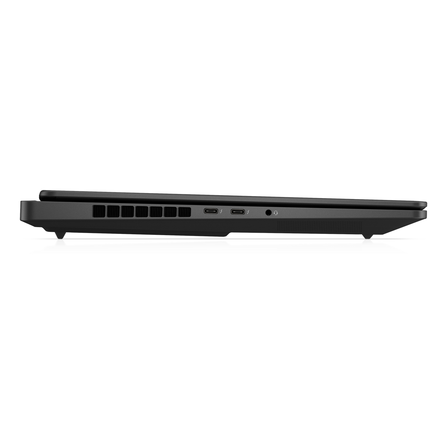 Side view of a black laptop, showing ports, vents, and a headphone jack against a black background, resting on a white surface.