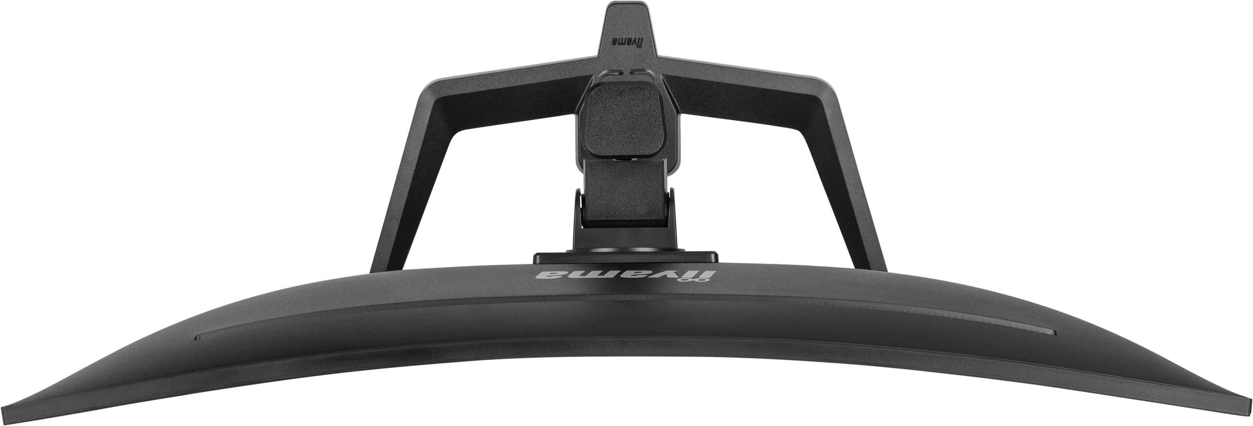 Zbliżenie czarnej, zakrzywionej podstawki monitora. Na podstawie widnieje nazwa marki 'Iiyama'.