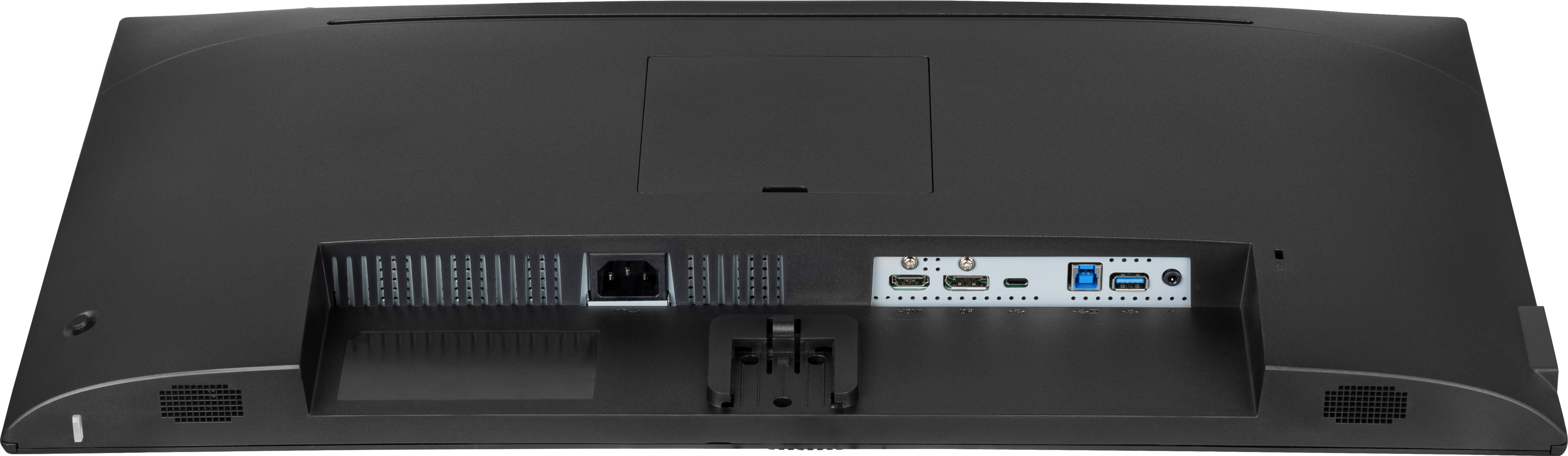 Rückansicht eines schwarzen Monitors. Zeigt Anschlüsse für Strom, HDMI, USB und andere Anschlüsse, mit einer Halterung.