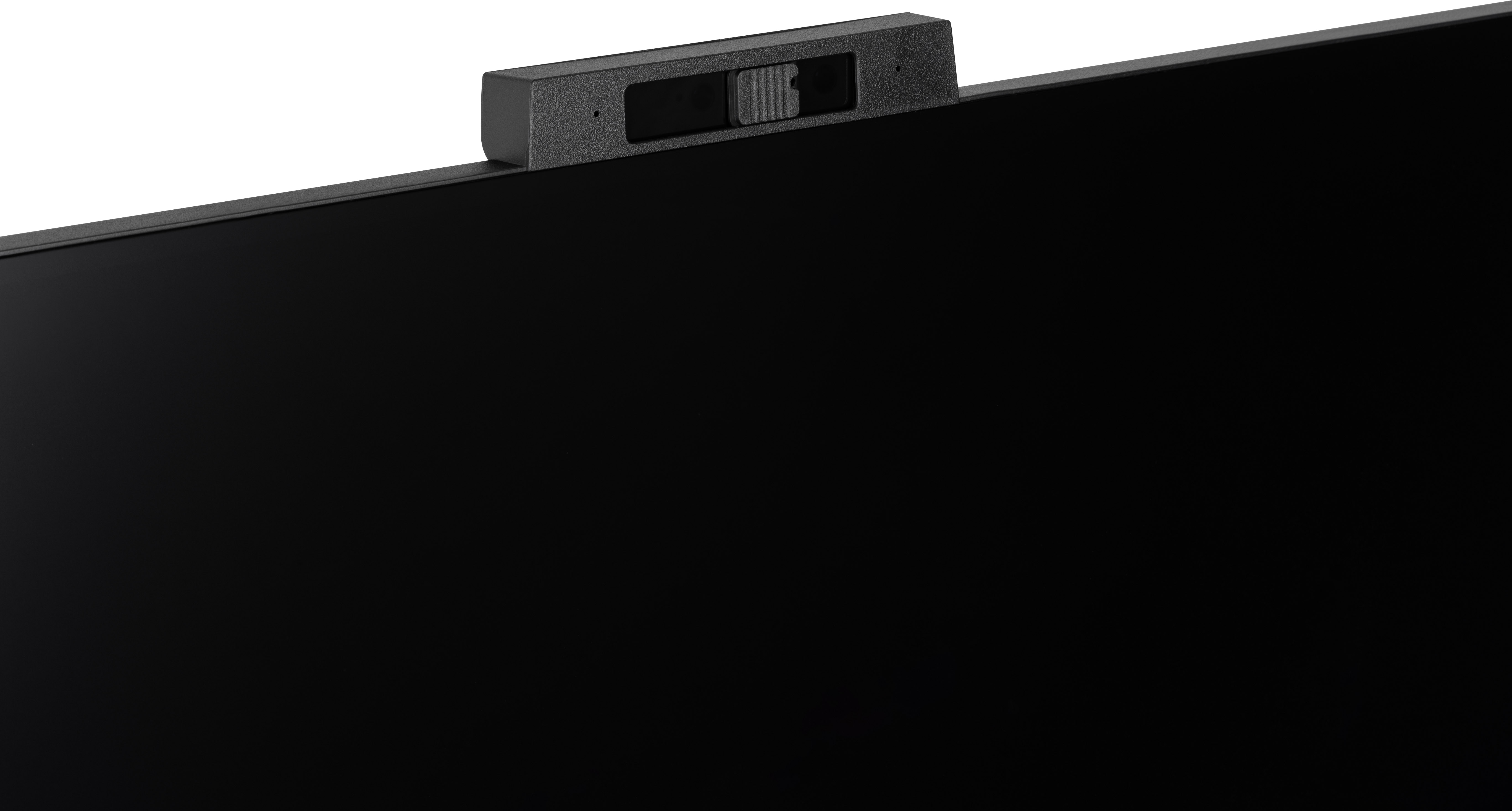 Nahaufnahme eines schwarzen Monitors mit einer Webcam oben. Weißer Hintergrund. Die Webcam hat eine Schiebeabdeckung.