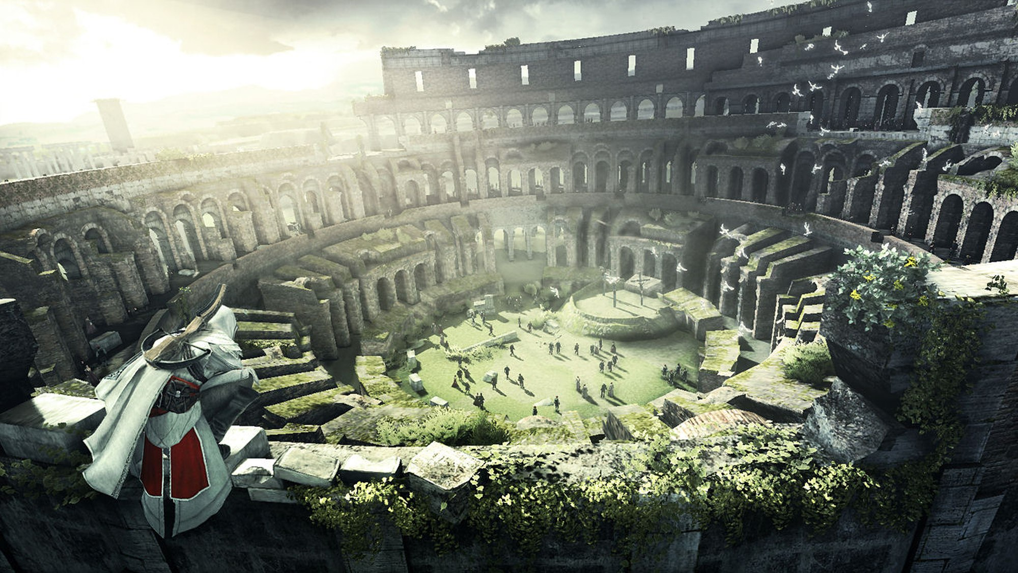 Vista aerea di un colosseo in rovina. Un assassino è in piedi sul bordo. Persone riunite nell'arena, uccelli che volano.