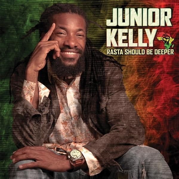 Mann mit Dreadlocks, lächelnd, trägt Jacke und Uhr. Albumcover: 'Junior Kelly, Rasta Should Be Deeper'.