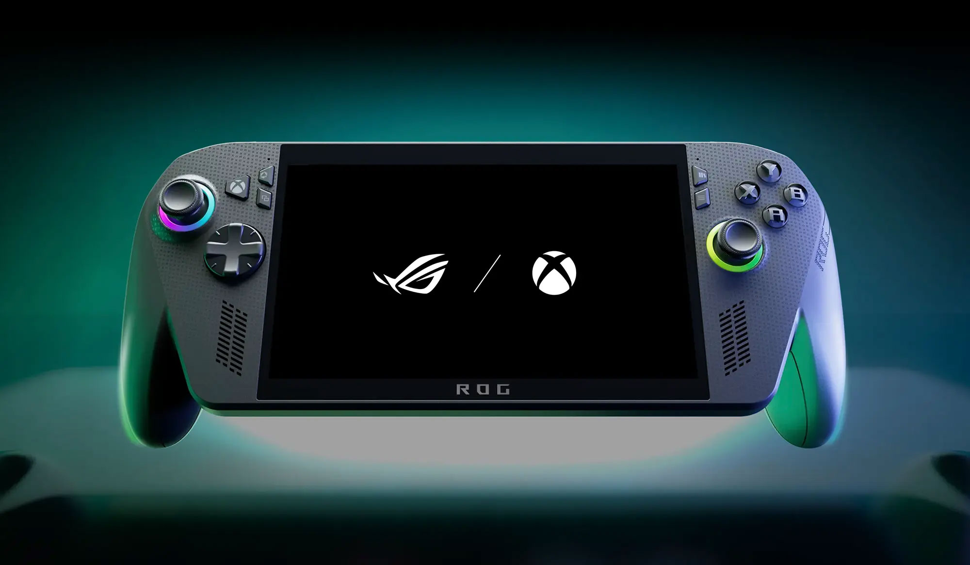 Przenośne urządzenie do gier. Ekran wyświetla logo ROG i Xbox. Ma szarą obudowę, kolorowe przyciski i czarny ekran.