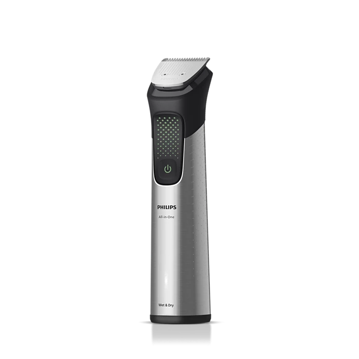 Ein silberner Philips All-in-One Trimmer. Er hat einen schwarzen Griff mit einem Ein-/Ausschalter. Der Trimmerkopf ist silber. Die Basis ist schwarz.