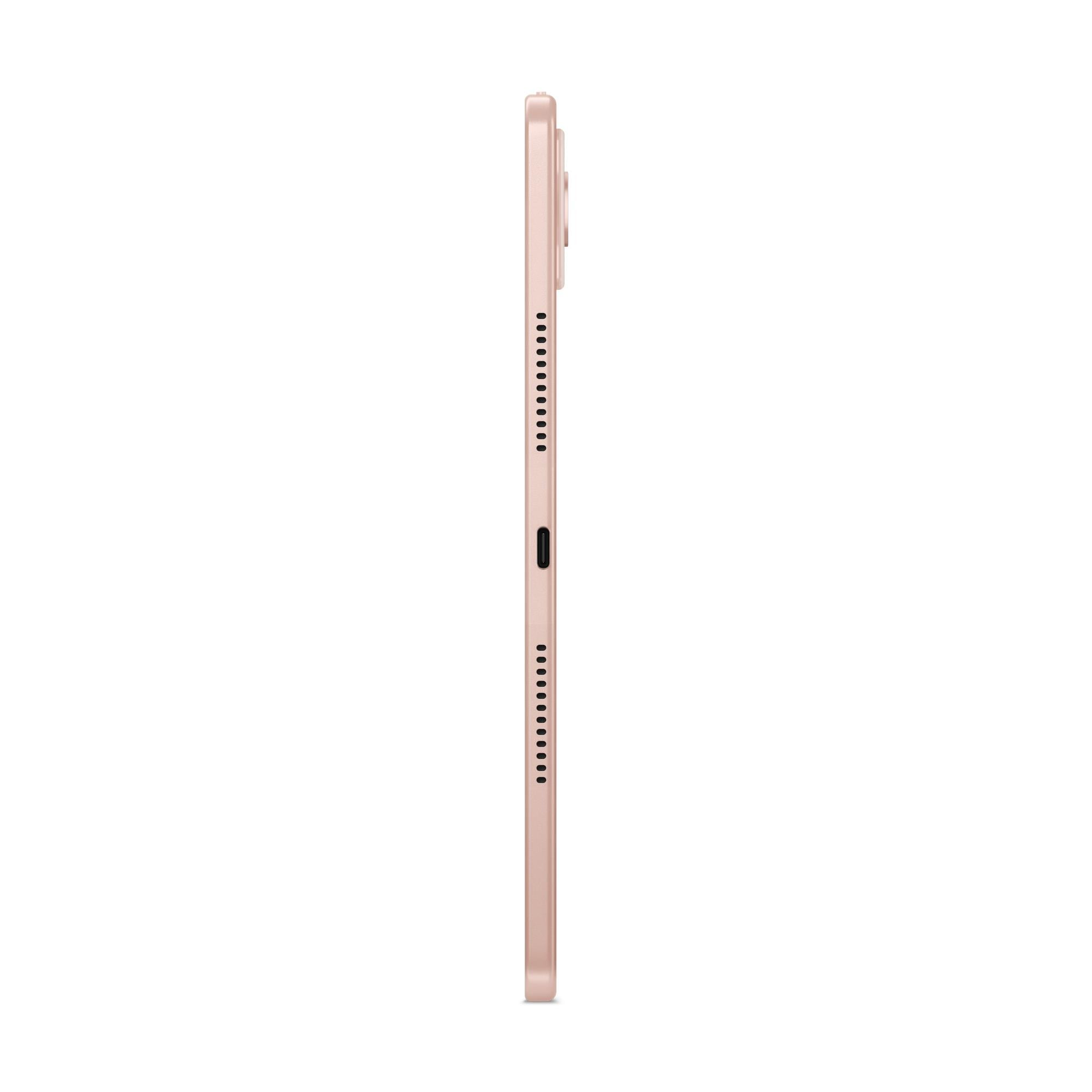 Seitenansicht eines roségoldenen Tablets. Es hat Lautsprecherlöcher und einen USB-C-Anschluss. Der Hintergrund ist weiß.