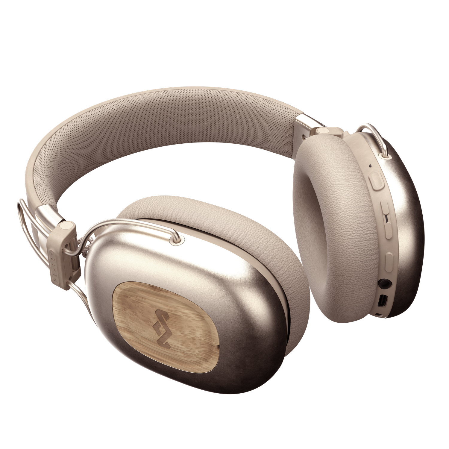 Casque audio beige et argenté avec des touches de bois. Le casque est posé sur un fond noir.
