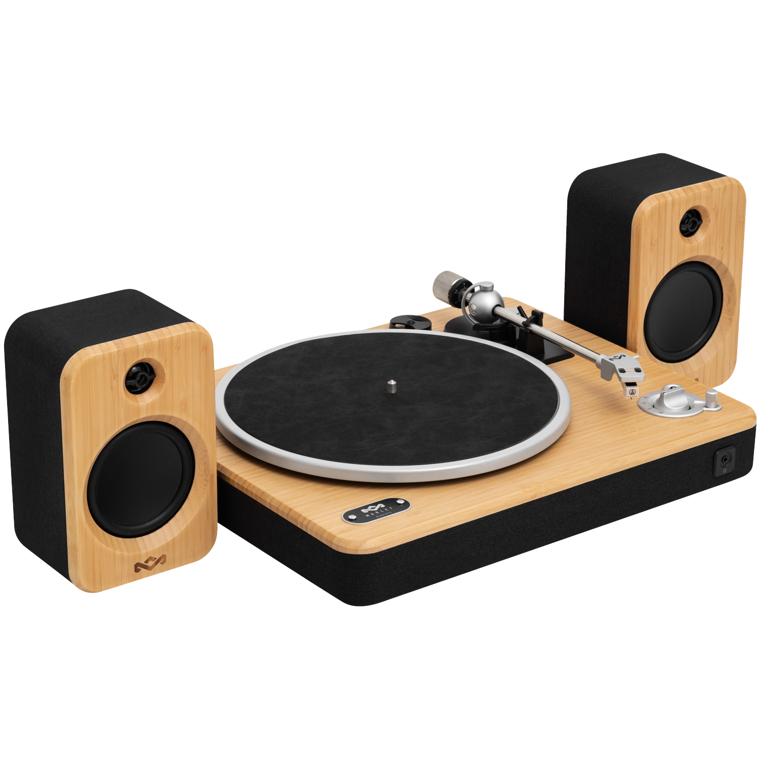 A wooden turntable with two speakers. The turntable has a black record and a silver arm. Speakers are black and wood.