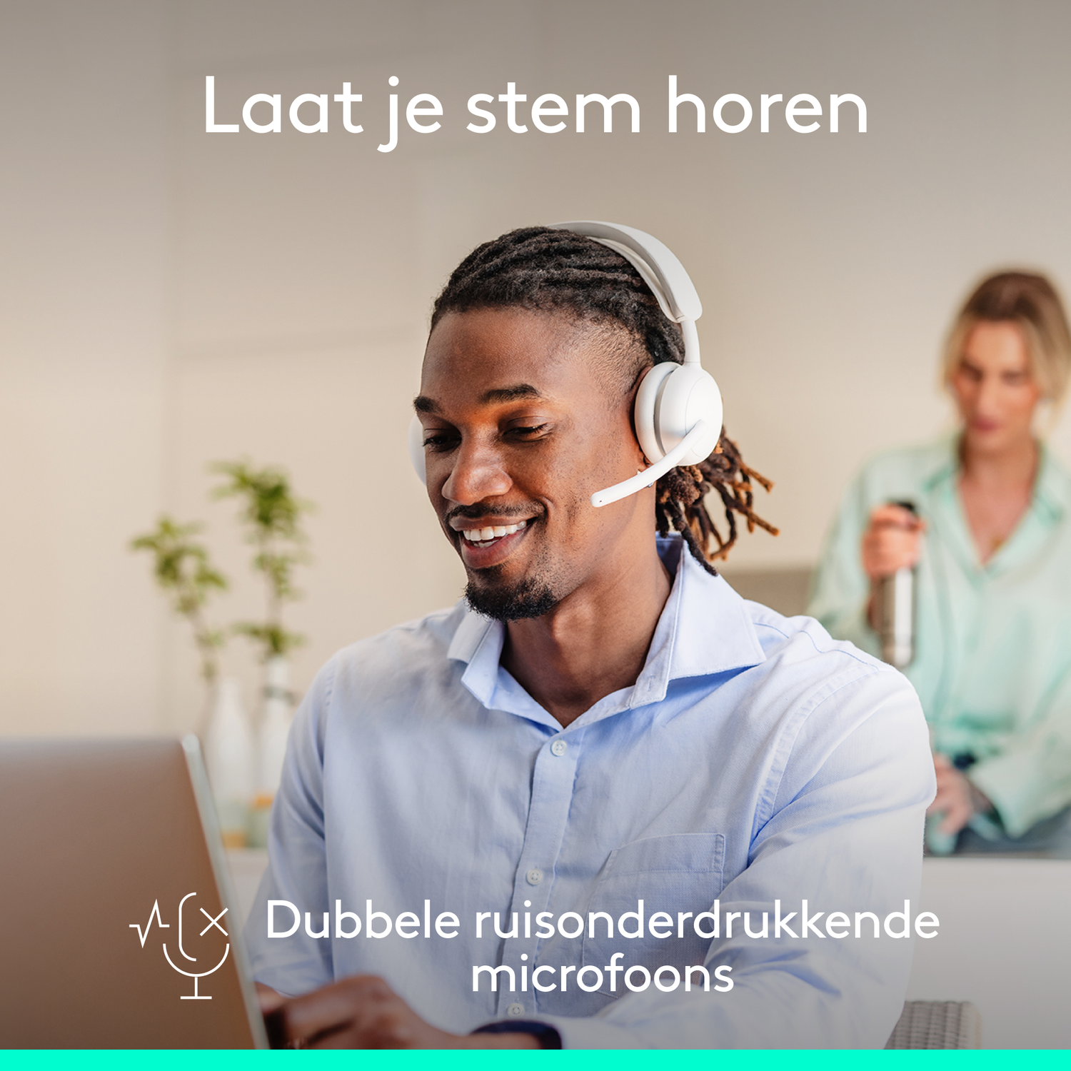 Man wearing headset smiles at laptop. Woman in background. Text says: Let your voice be heard, double noise-canceling microphones.