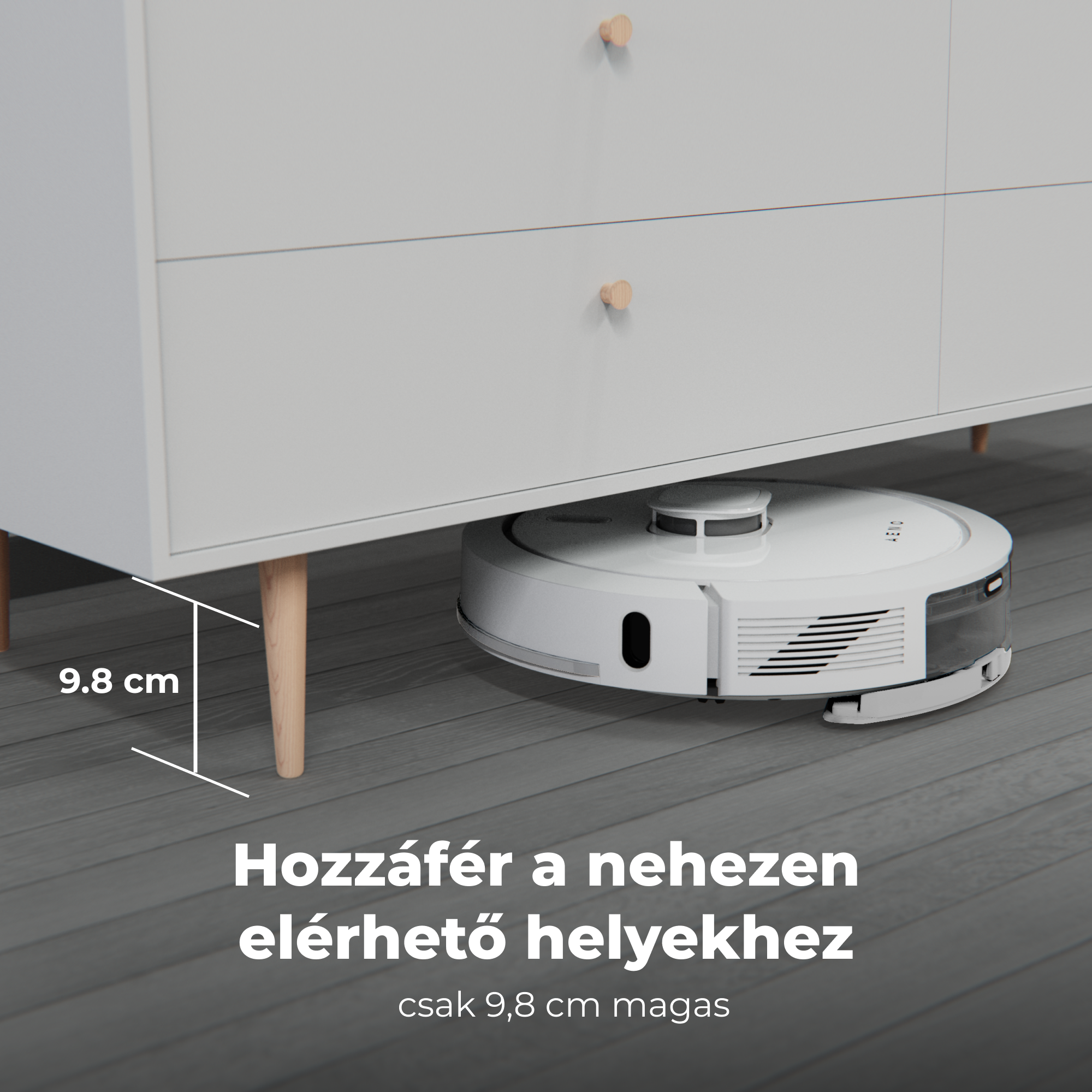 Egy fehér robotporszívó egy fehér szekrény alatt van. A szekrény a porszívó felett van.