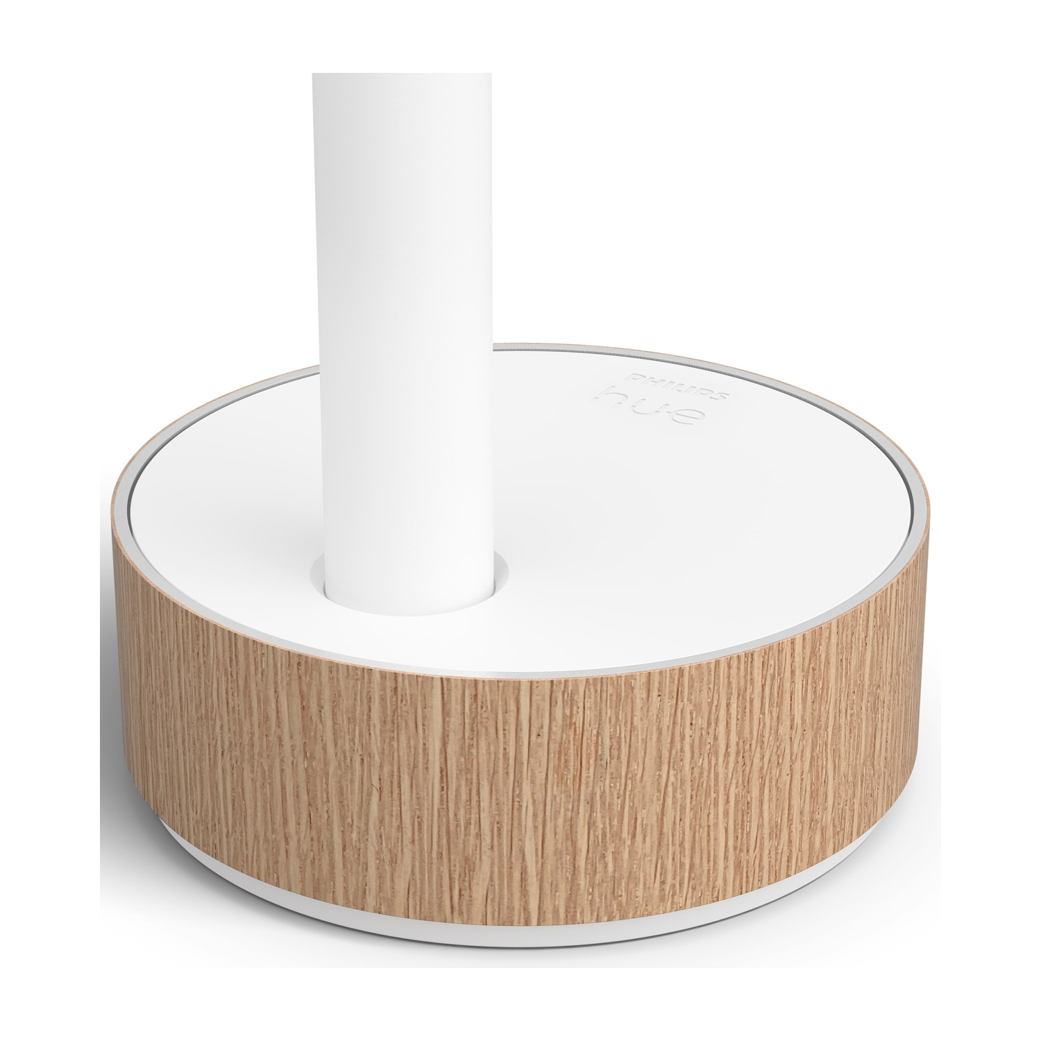 Una base per lampada bianca con lati in legno. Un cilindro bianco si alza dal centro. La parte superiore ha il testo 'Philips hue'.
