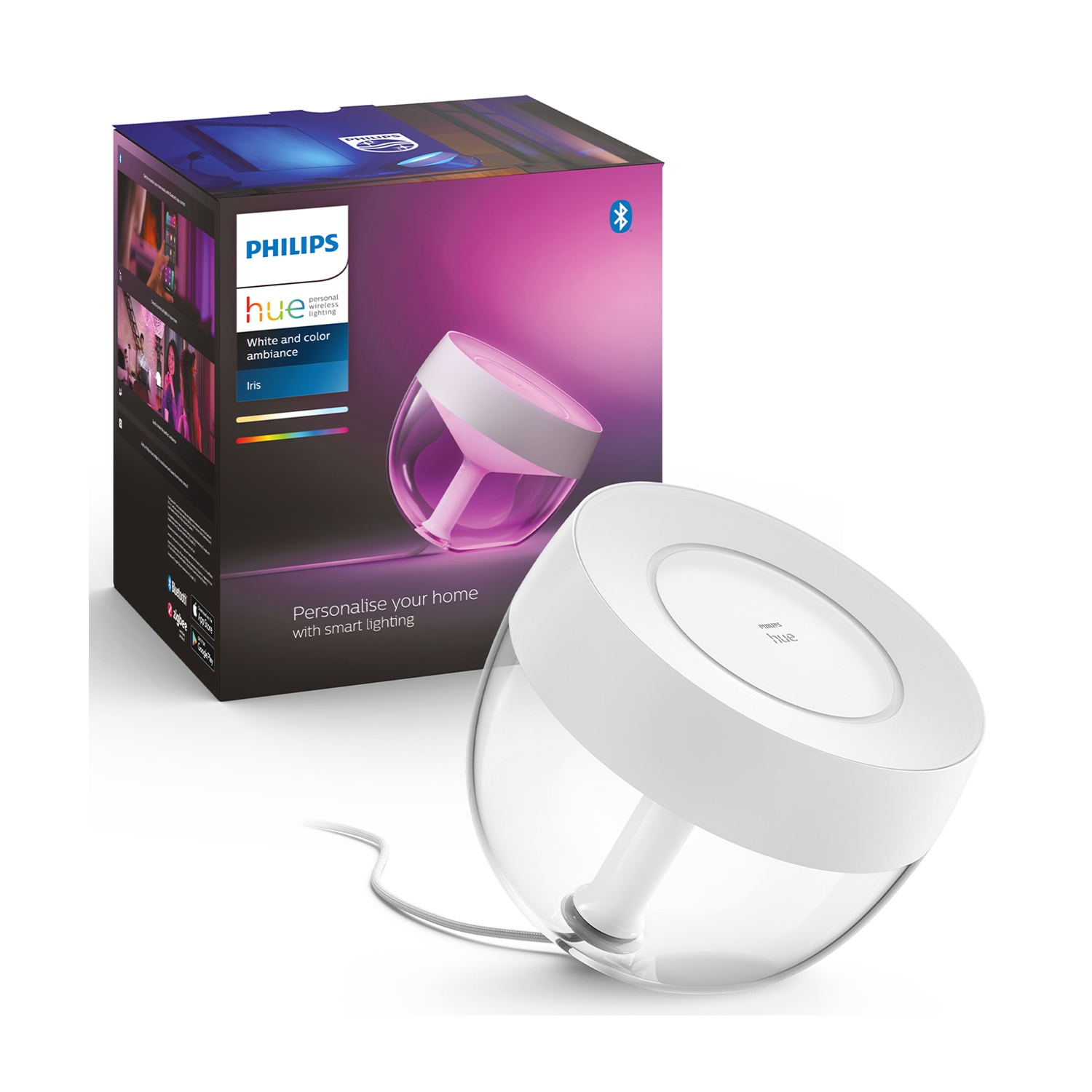 Una lampada Philips Hue Iris e la sua scatola. La lampada è bianca e trasparente, la scatola mostra i dettagli del prodotto.