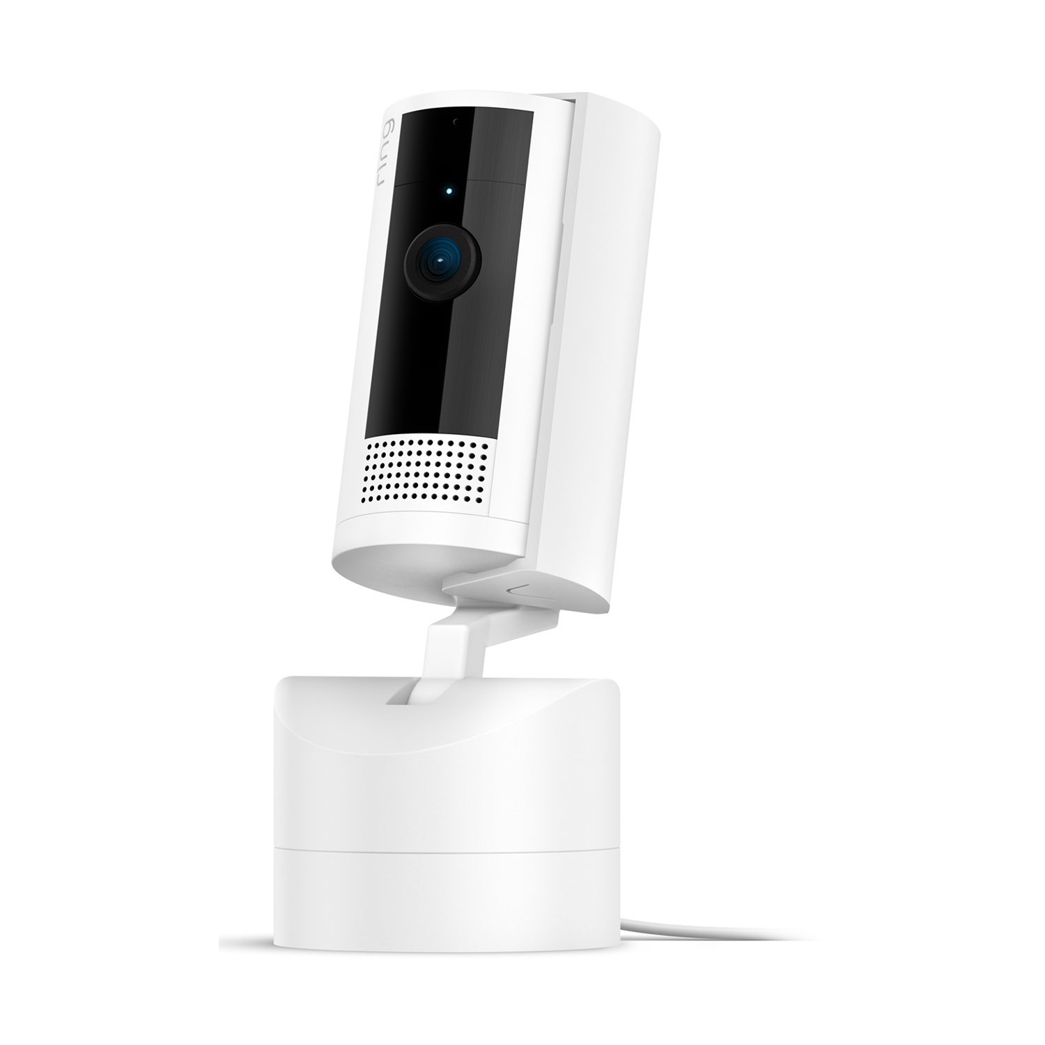 Una telecamera di sicurezza Ring bianca su una base bianca. Ha un obiettivo nero, un pannello nero e un altoparlante. La telecamera è angolata.