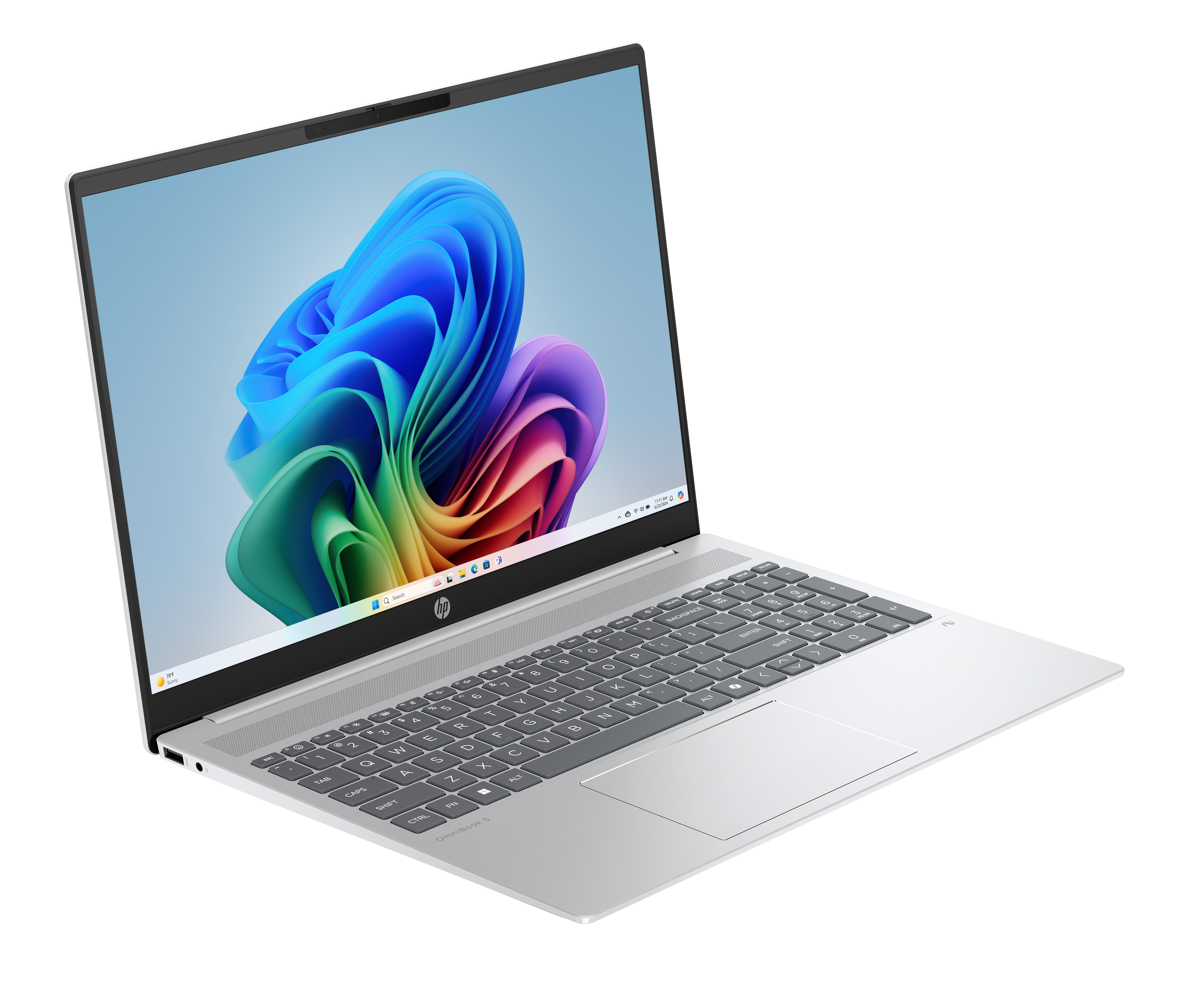 Otwarty srebrny laptop, kolorowy abstrakcyjny ekran. Klawiatura widoczna, czarne tło. Logo HP.