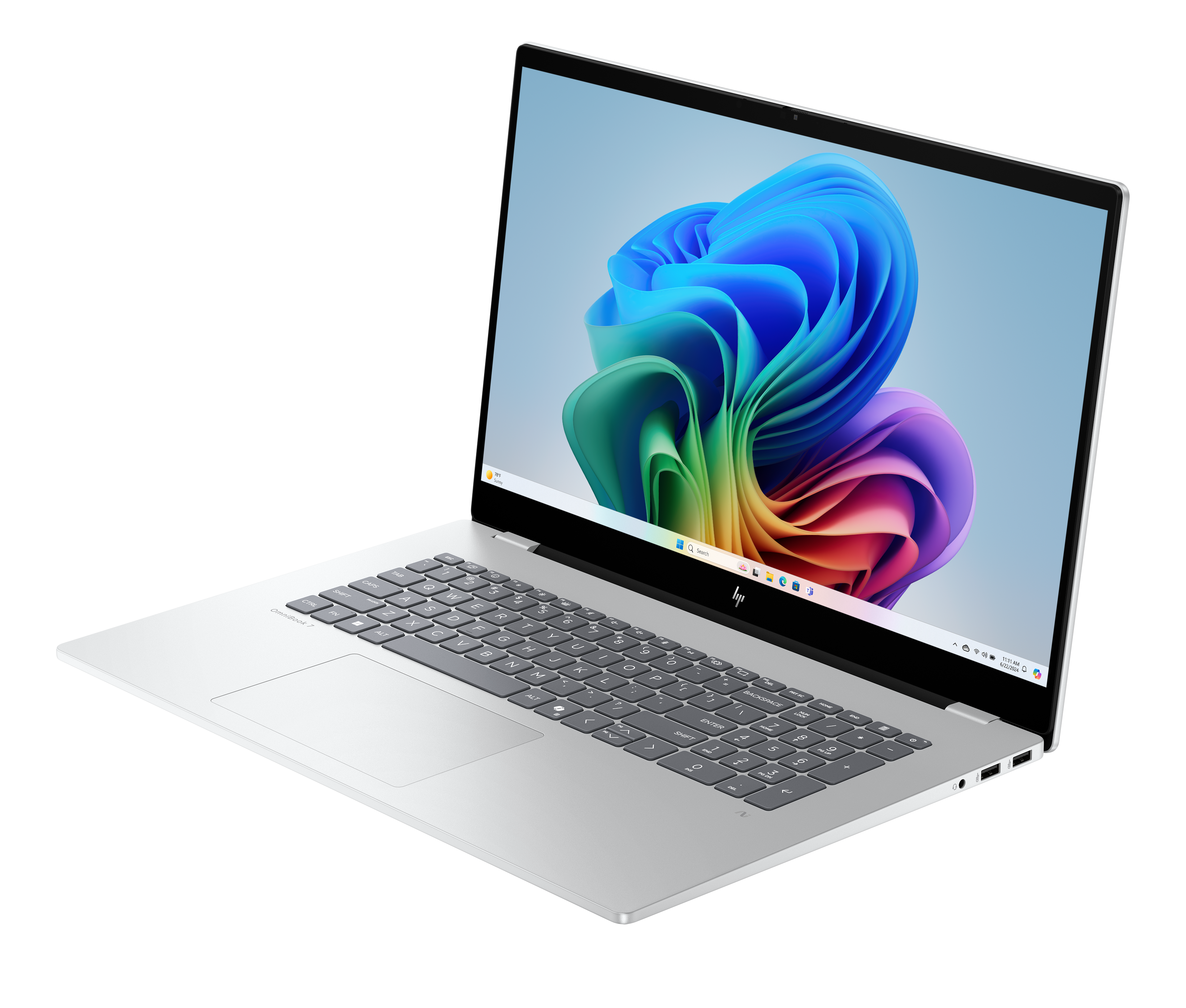 Otwarty srebrny laptop, kolorowe abstrakcyjne tło na ekranie. Czarne tło.