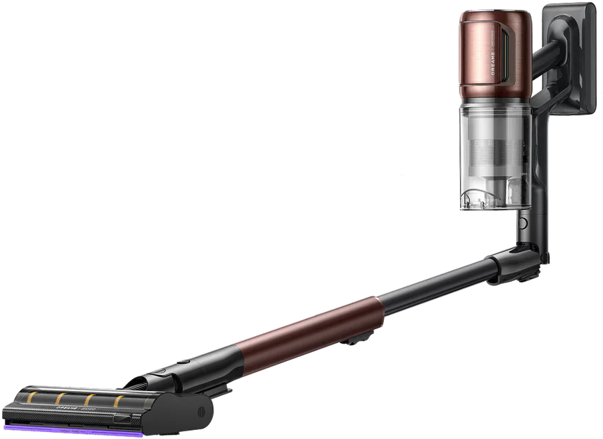 Aspirateur sans fil, bronze et noir, sur fond noir. L'aspirateur est incliné, montrant la tête et le moteur.
