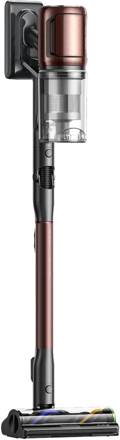 Un aspirateur sans fil avec une finition bronze métallique. Il possède une longue poignée, une tête de brosse et un bac à poussière. Le fond est noir.