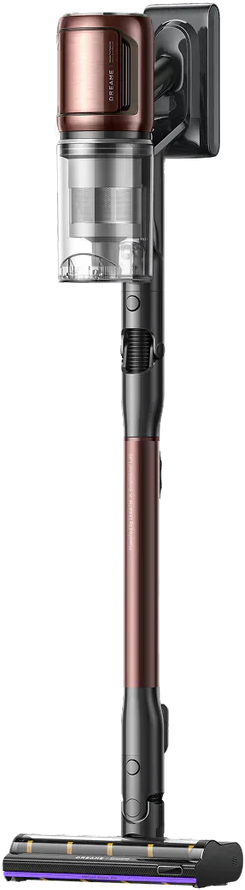 Un aspirateur sans fil, marron métallique et gris. Il a une longue poignée, un bac à poussière et une tête de brosse. Le logo Dreame est visible.