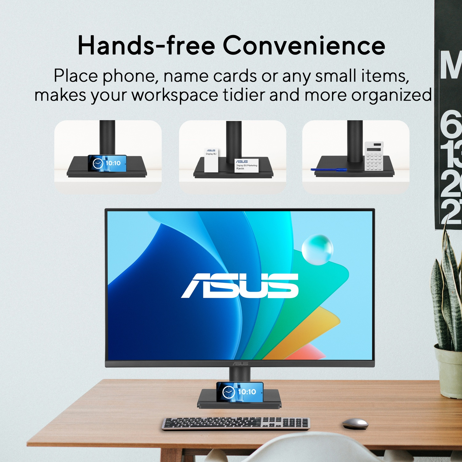 Un monitor ASUS su una scrivania in legno con telefono, tastiera e mouse. Il testo dice 'Comodità a mani libere'.