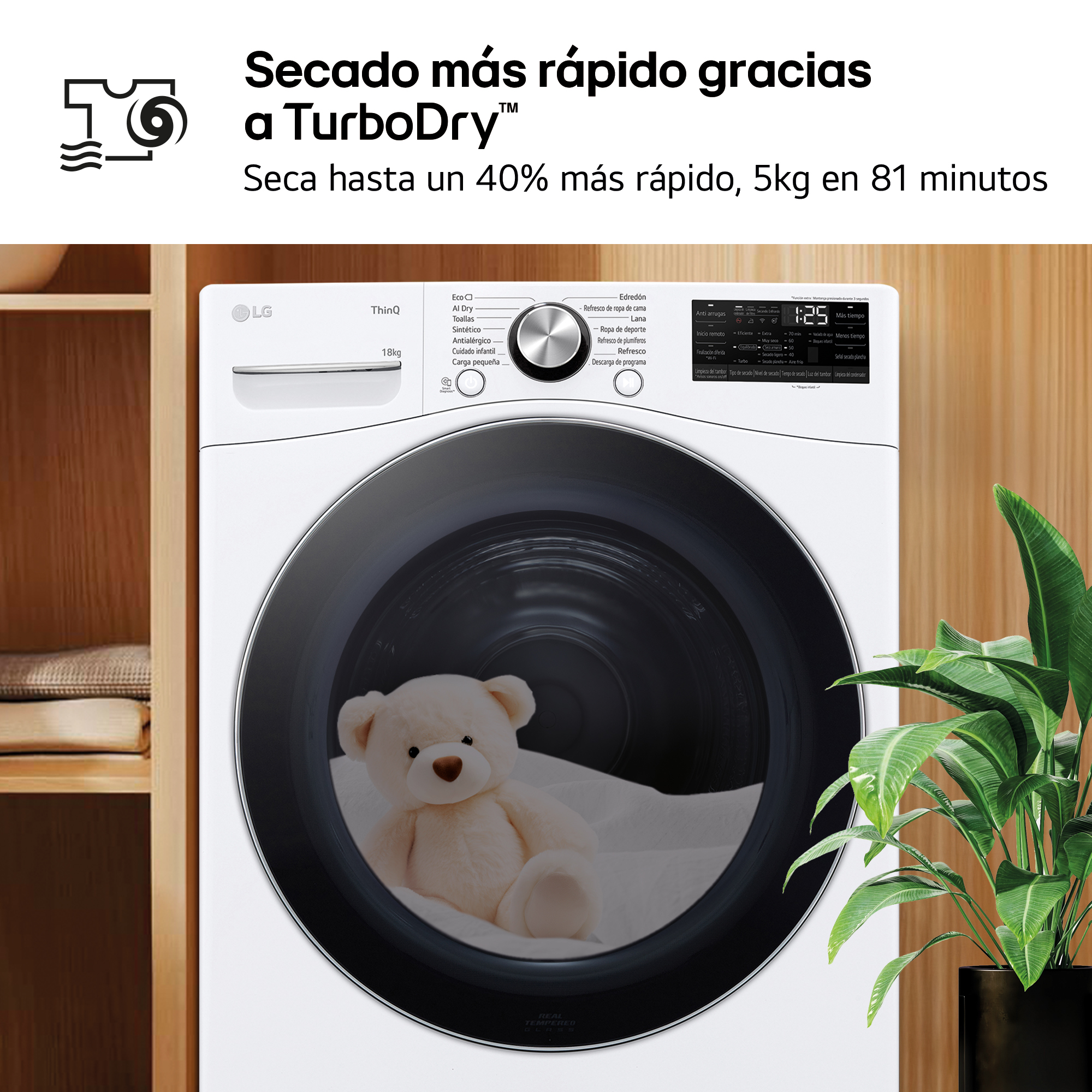 Una secadora LG blanca con un oso de peluche dentro. Una planta verde a la derecha. El texto superior dice TurboDry.