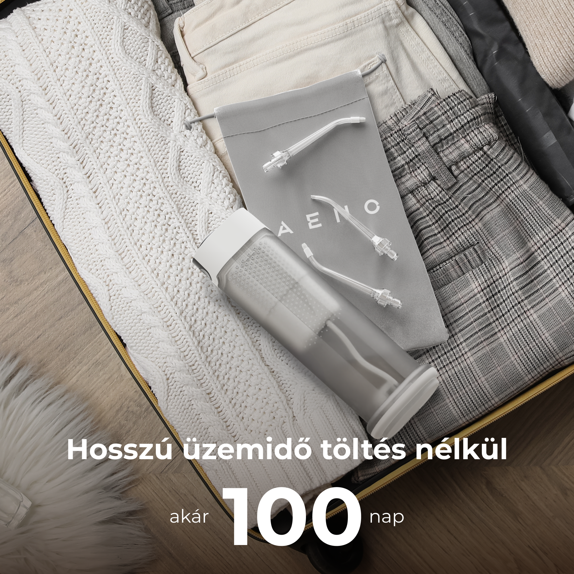 Bőrönd ruhákkal, fogtisztító eszközökkel. Szöveg: Hosszú üzemidő töltés nélkül, akár 100 nap.