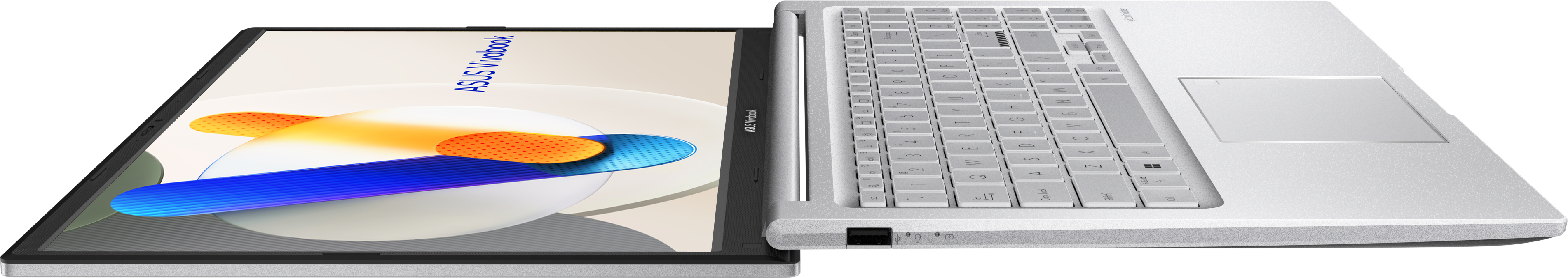 Nyitott laptop. A képernyő absztrakt dizájnt mutat. Billentyűzet látható. Ezüst szín. Fekete háttér. ASUS Vivobook márka.