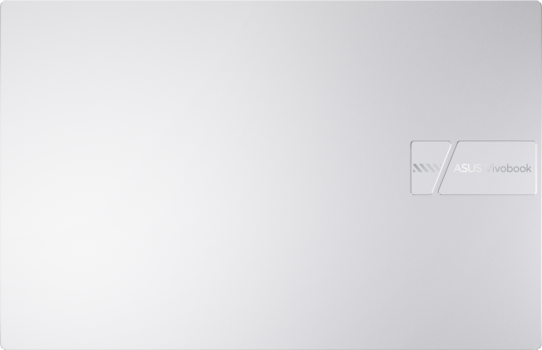 Ezüst laptopfedél, jobb alsó sarokban az ASUS Vivobook logóval. A fedél tiszta és minimalista.